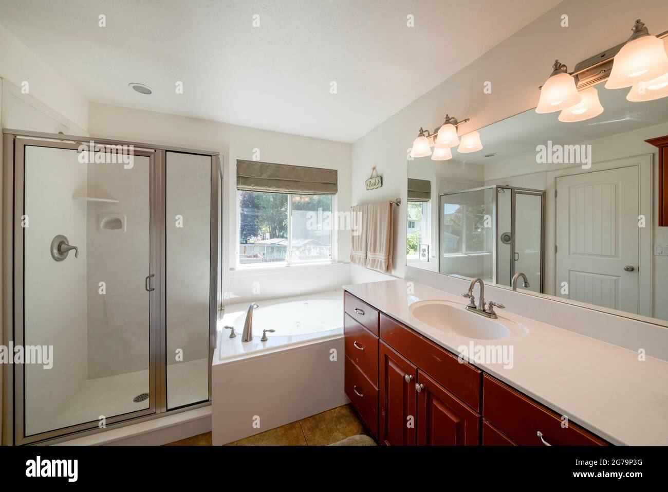Bathroom interior with large vanity sink and window Stock Photo