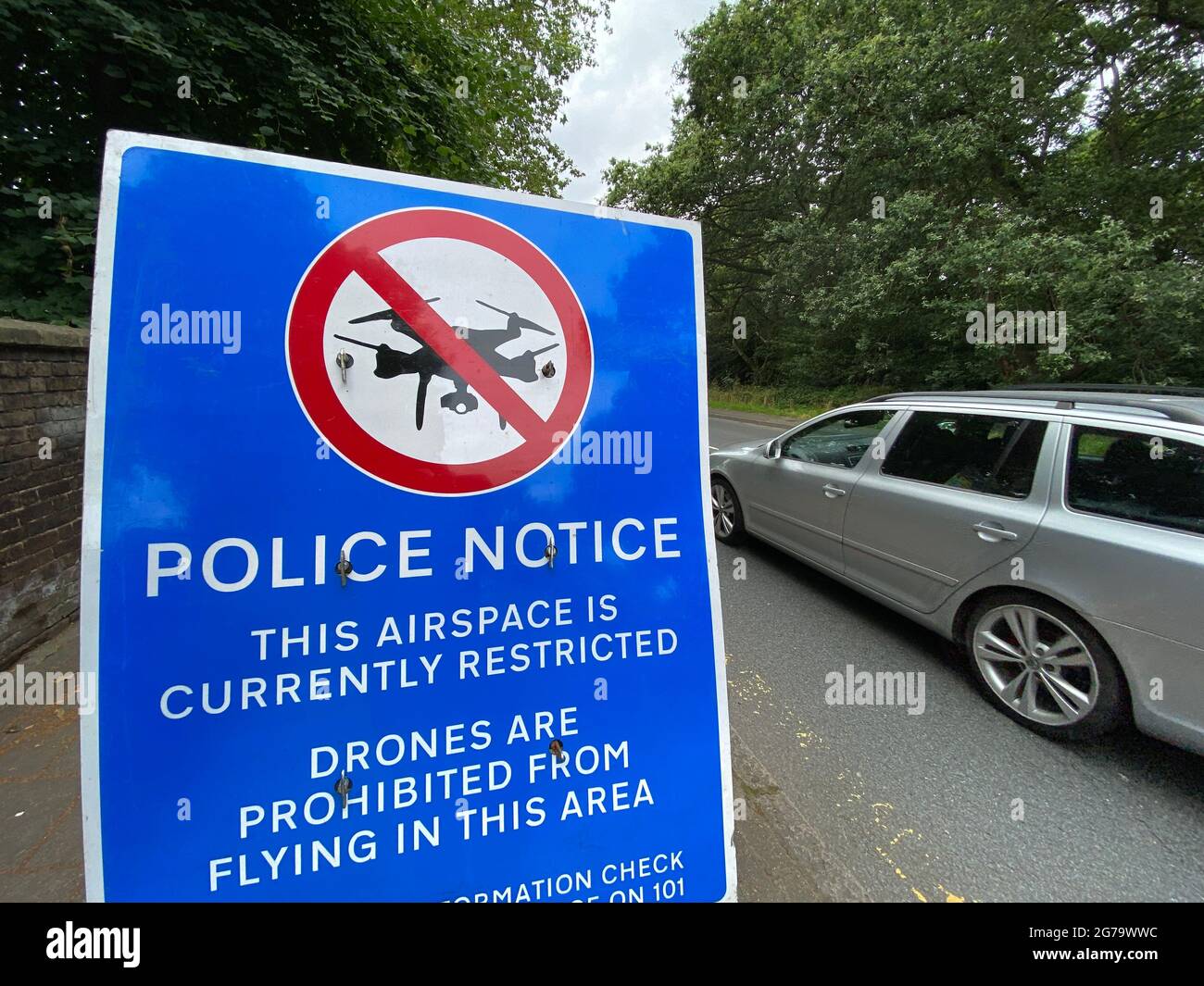 A police sign near Wimbledon in south west London warns drone pilots that the airspace is restricted and that the flying of drone is prohibited. Picture date: Sunday July 11, 2021. Stock Photo