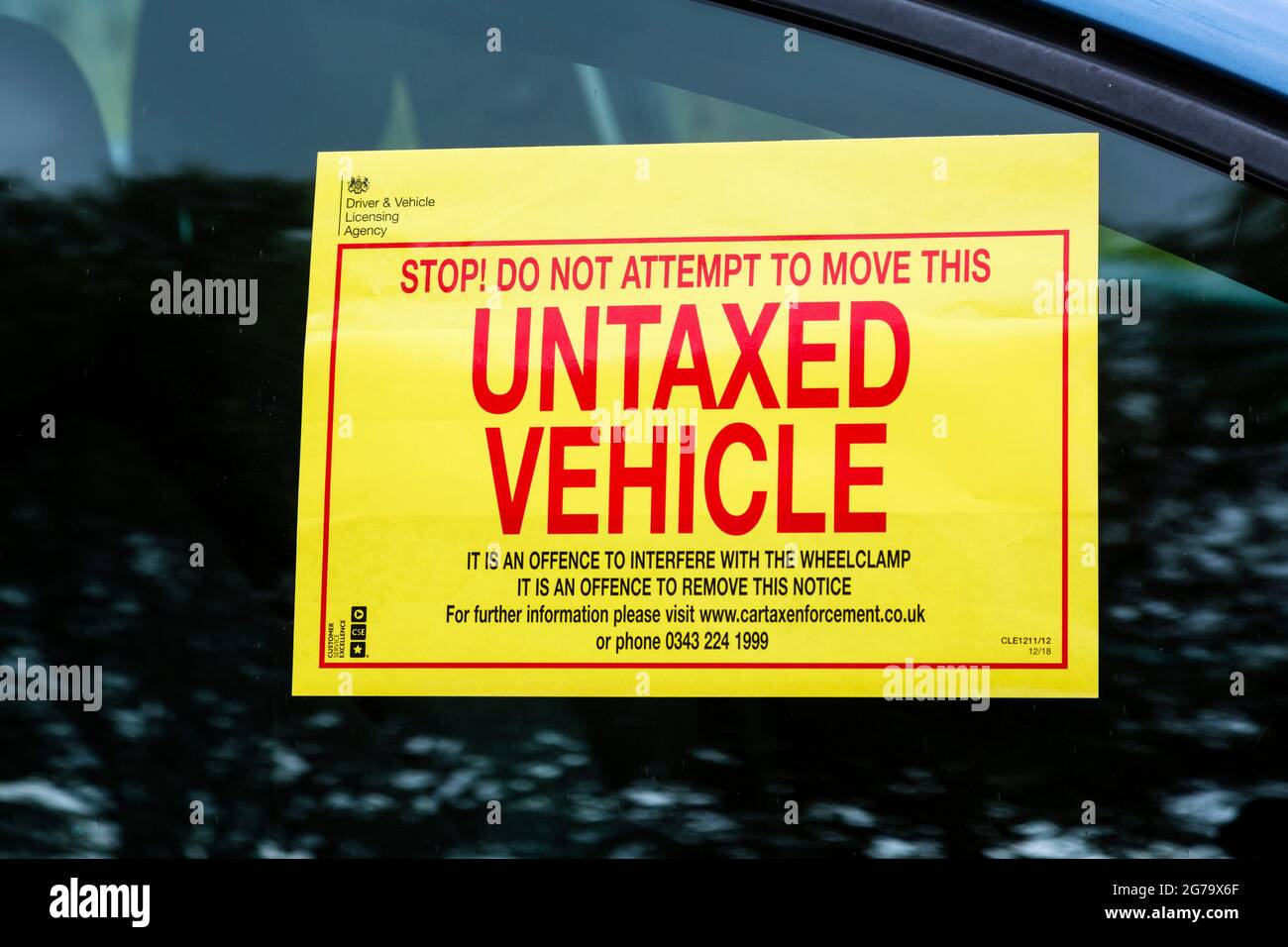 DVLA warning sign on an Untaxed Vehicle window, UK Stock Photo