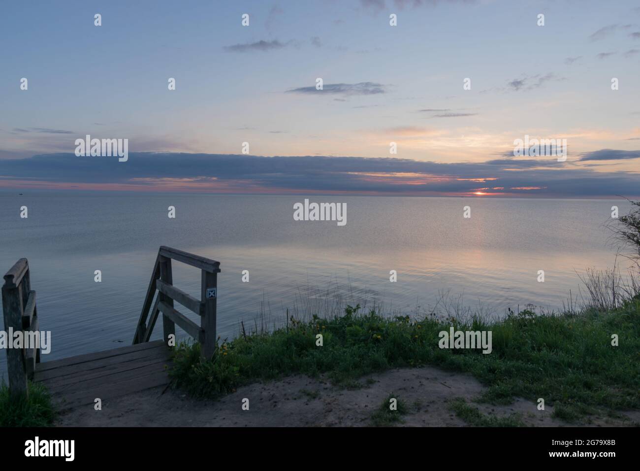 Sunrise on the steep coast with a view of the Ostee in Dänischenhagen, Schleswig-Holstein. Stock Photo