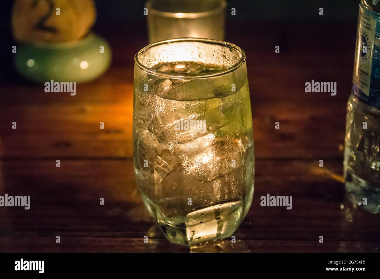 A cool and refreshing glass of ice water,  ice cold,  drink,  on vacation on Ko Chang,  Thailand Stock Photo