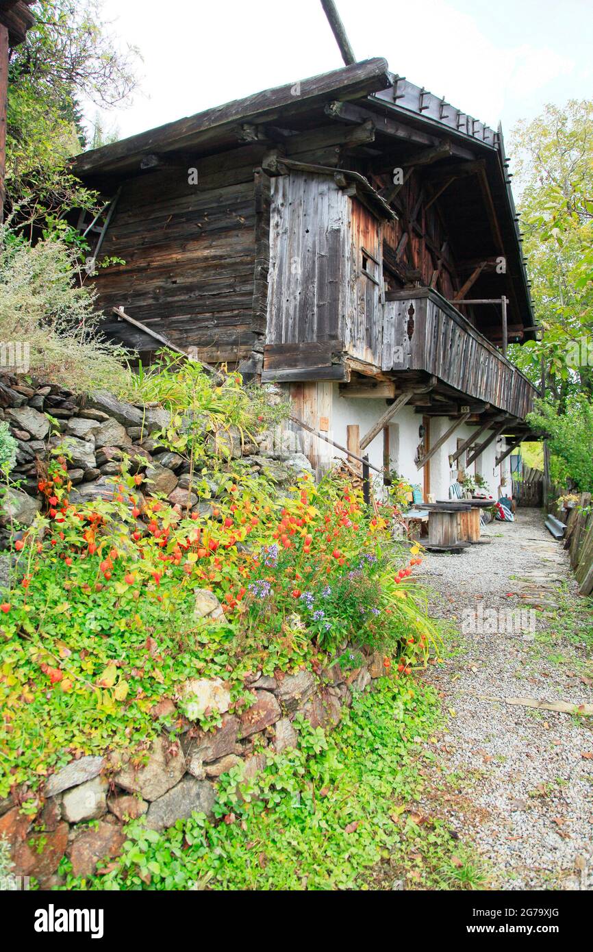 Flowers at an old mountain farmhouse in the Ulten Valley in South Tyrol Stock Photo