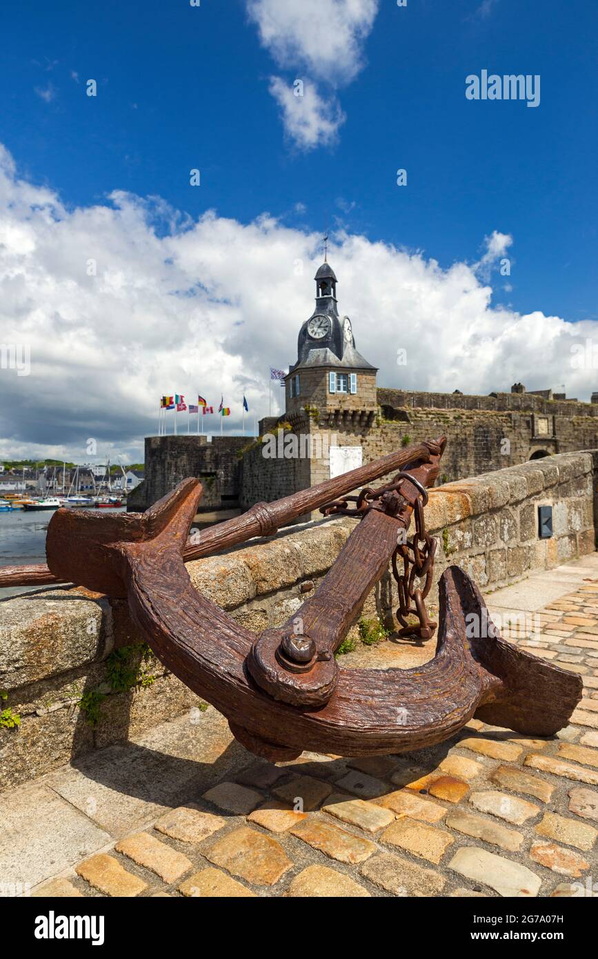 Concarneau, anchor on the bridge to the old town Ville Close, in the background the clock tower and the city wall, France, Brittany, Finistère department Stock Photo