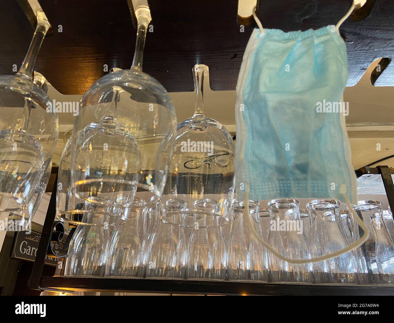 beer taps in pub bar with cleaning spray following covid19 guidelines