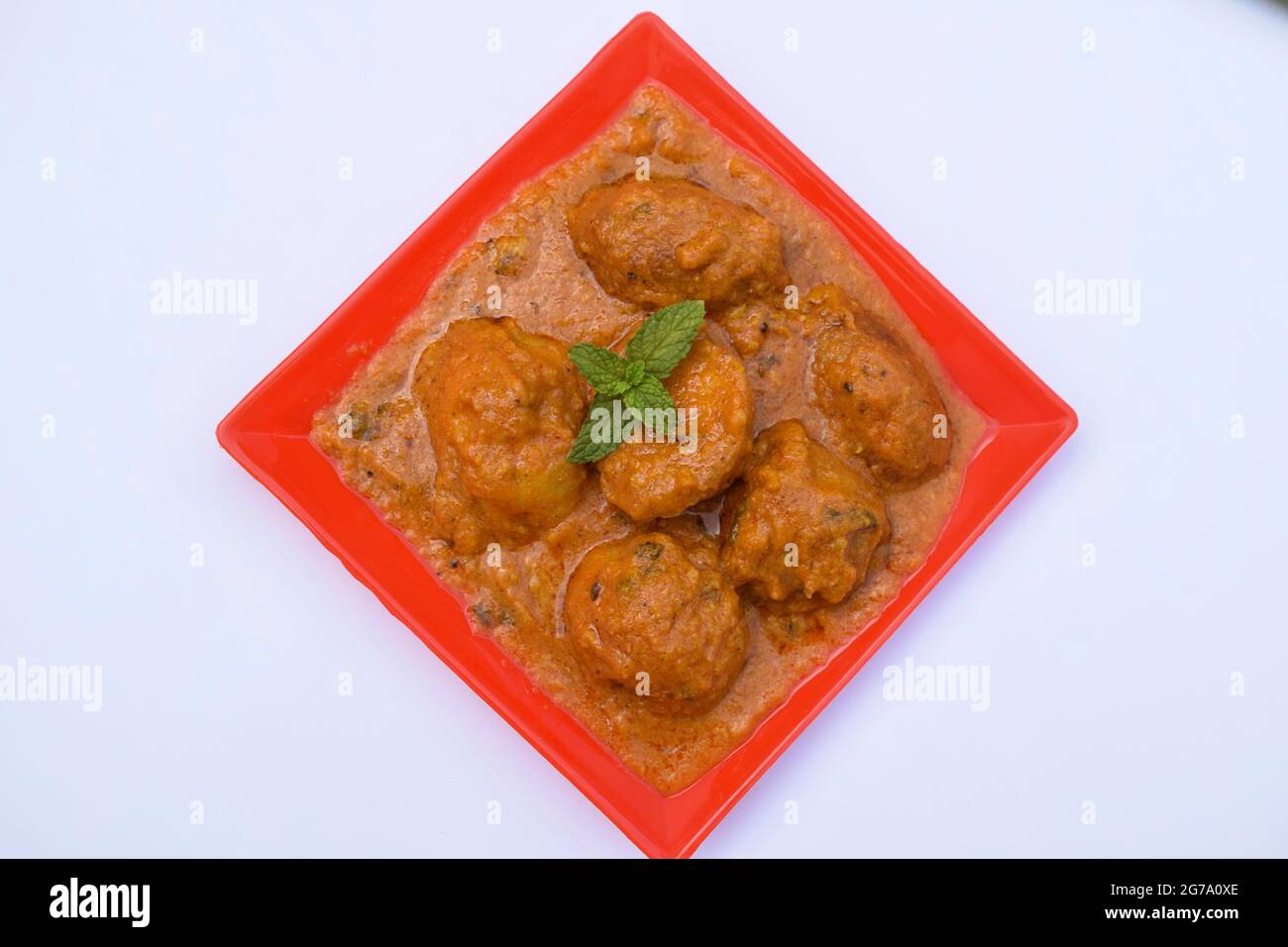 popular punjabi North Indian side dish Dum aloo with gravy. Indian food recipe baby potato