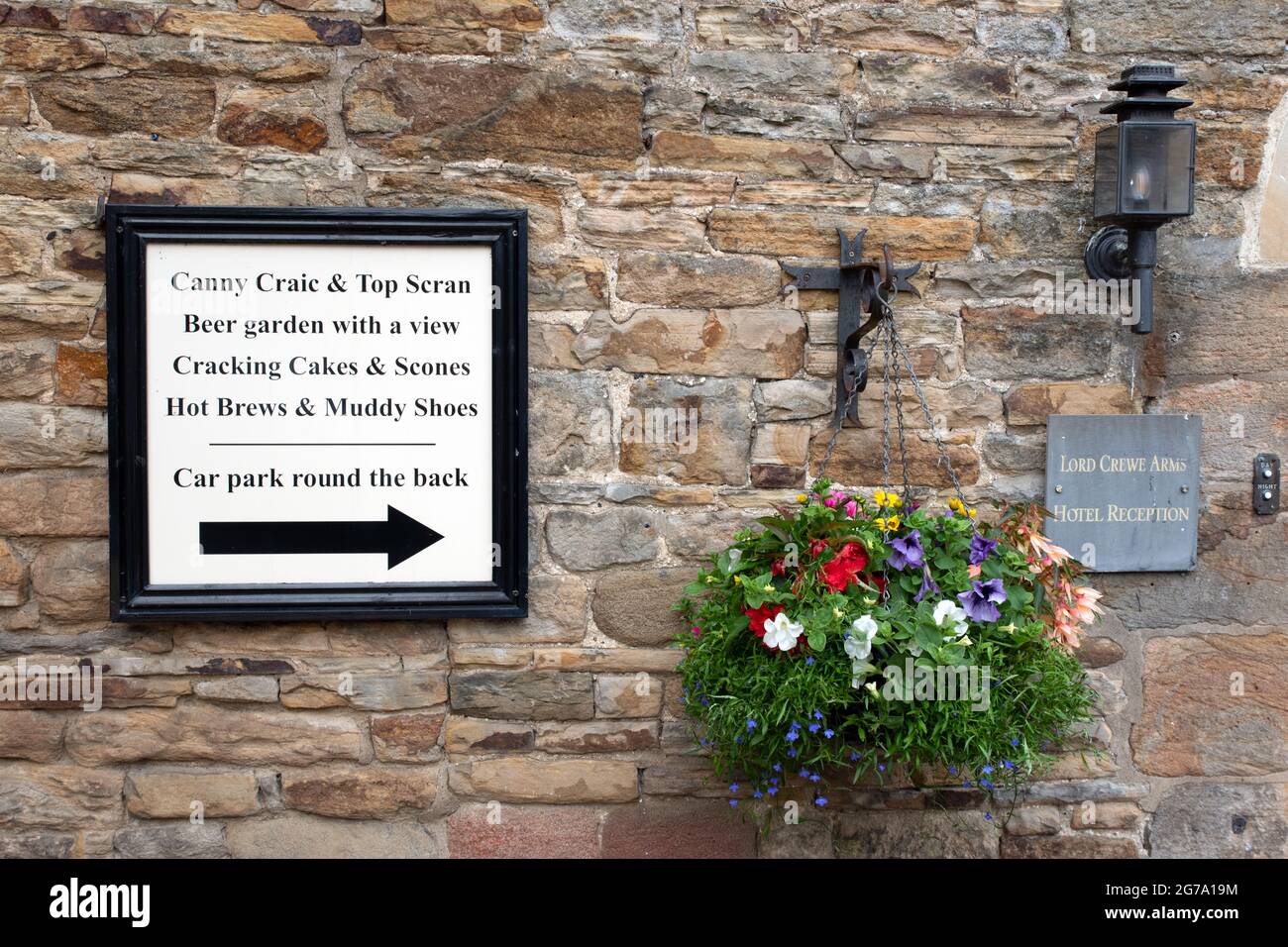 Sign outside The Lord Crewe Arms in Blanchland model village Northumberland Stock Photo