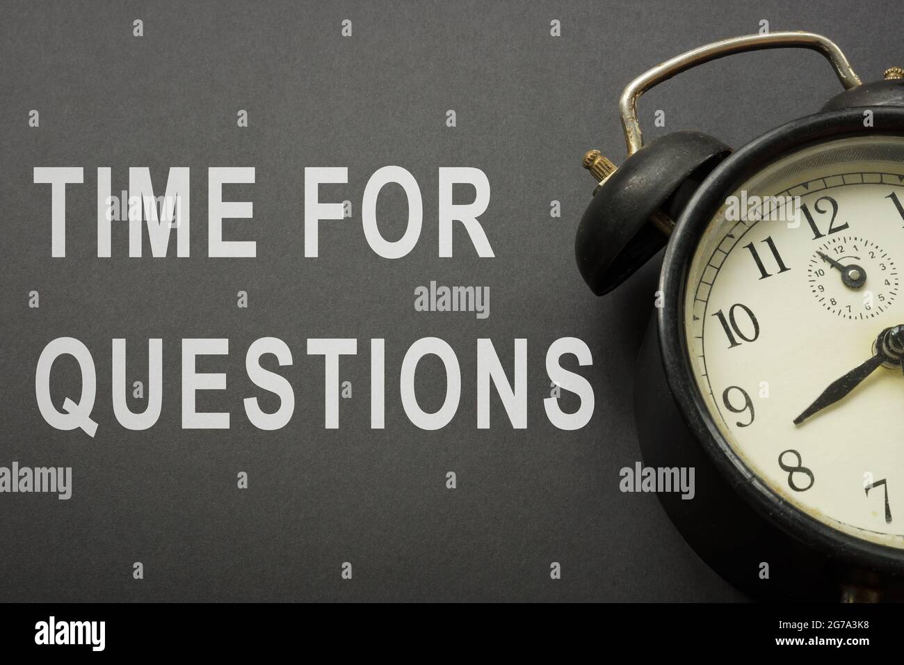 Time for questions words and old alarm clocks Stock Photo Alamy