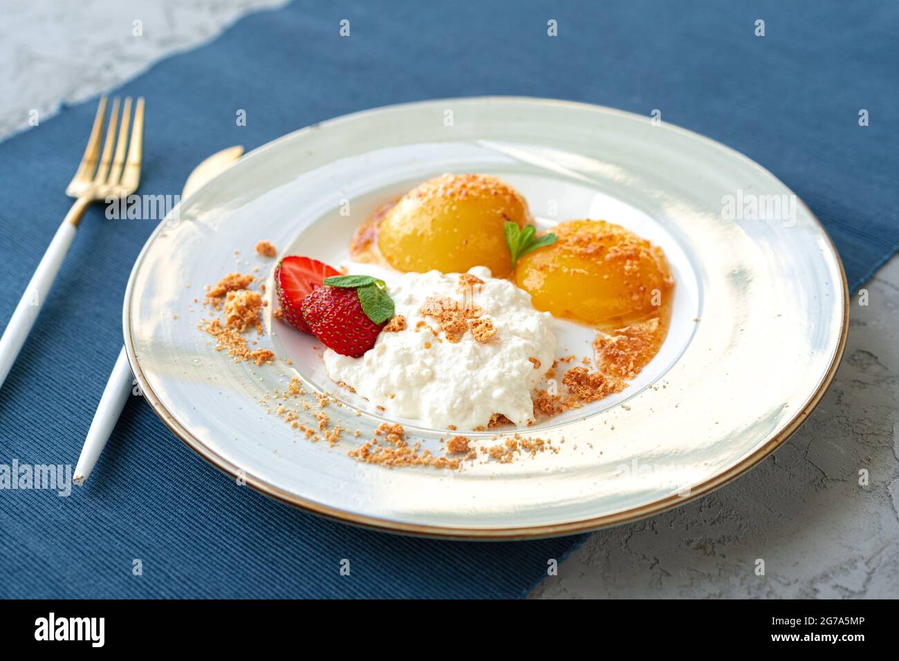 Cottage cheese and canned apricots, healthy breakfast Stock Photo Alamy