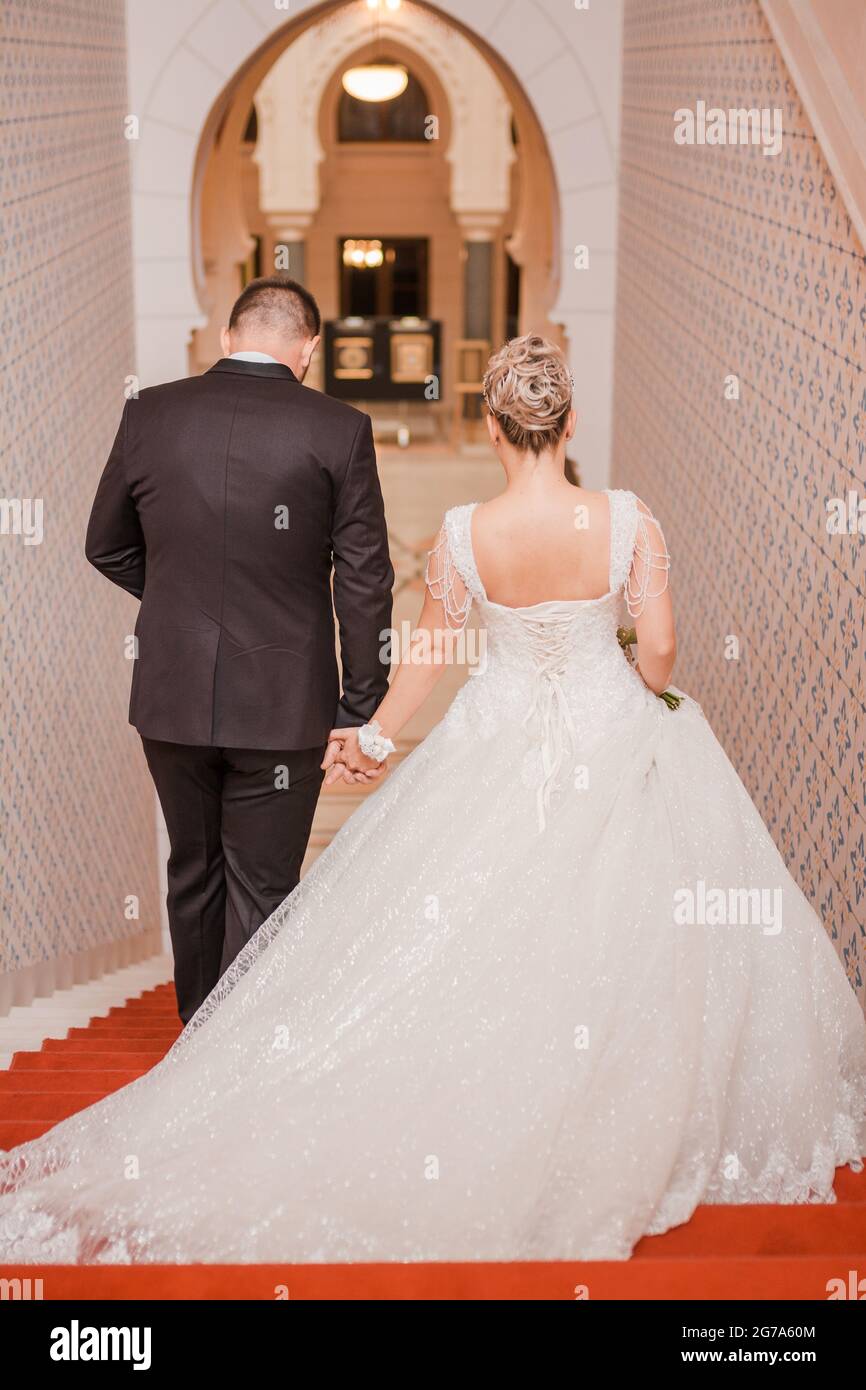 wedding day bride and groom photoshooting Stock Photo