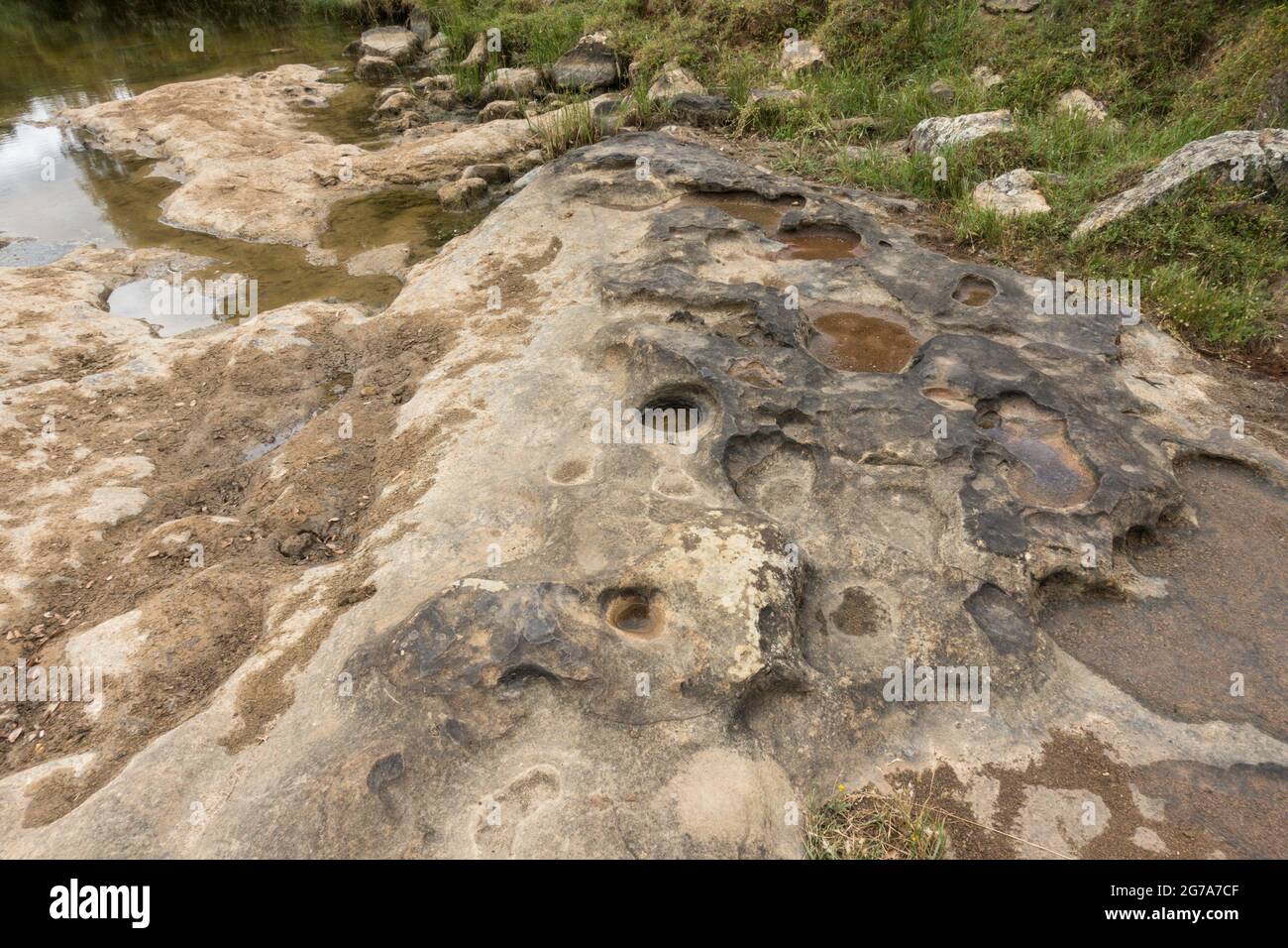 Eroded river bed, forming potholes in limestone rock, Spain, Stock Photo