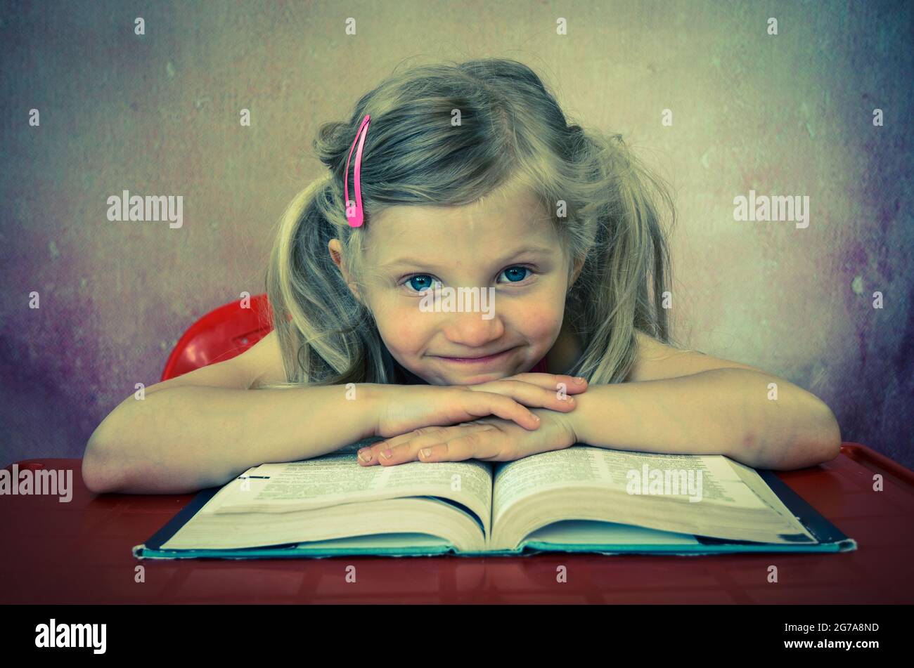 beautiful blond girl with open book Stock Photo - Alamy