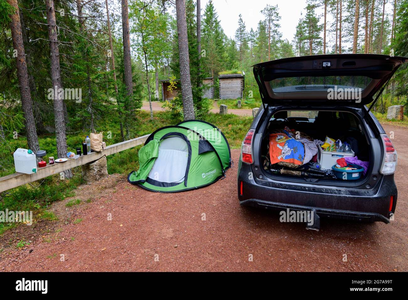 Tourist pop up tent and a car on a parking place in Hamra National Park, Sweden Stock Photo