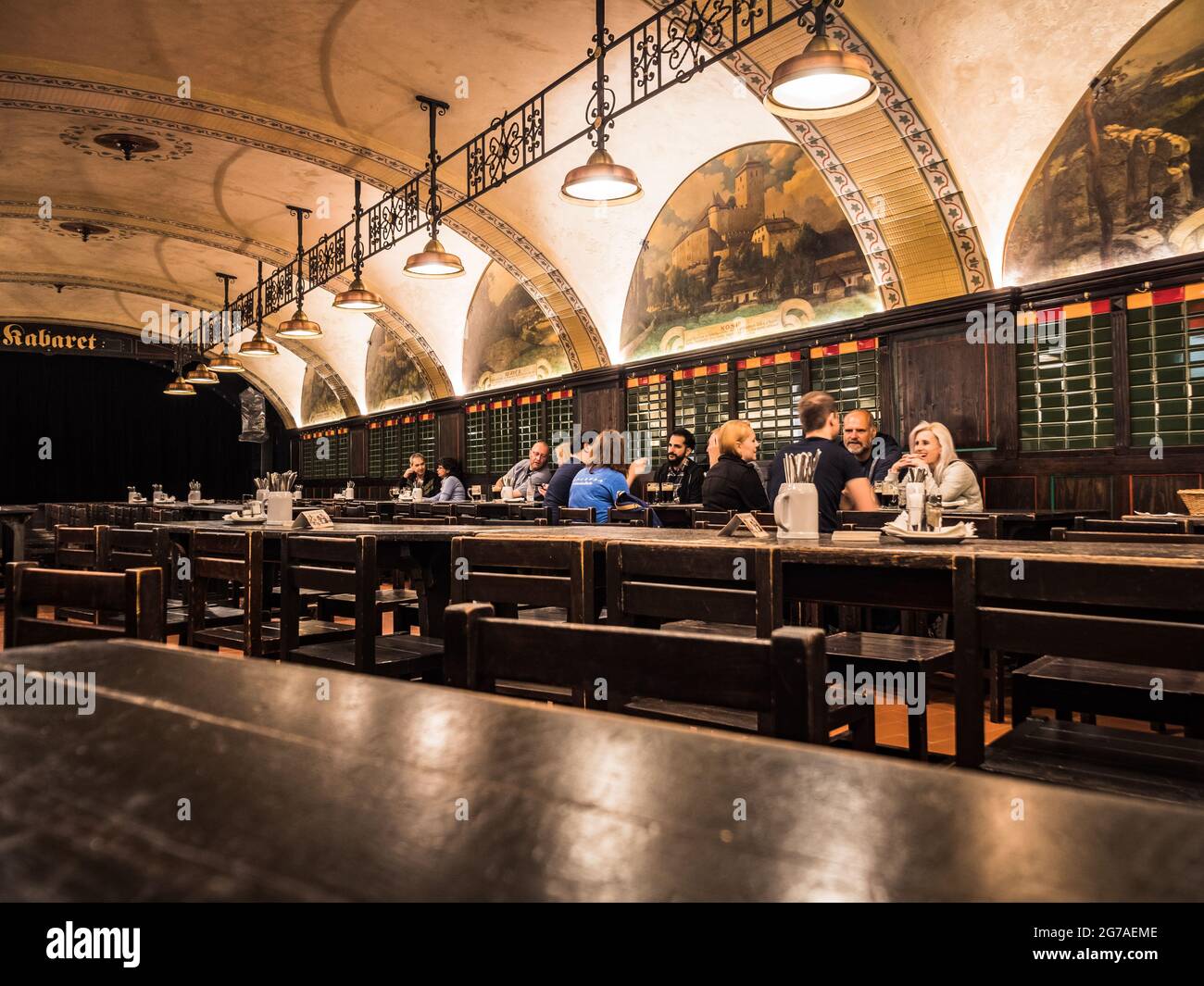 Prague, Czech Republic - July 2 2021: U Fleku Brewery Beer Hall and Restaurant Interior with Guests. Stock Photo