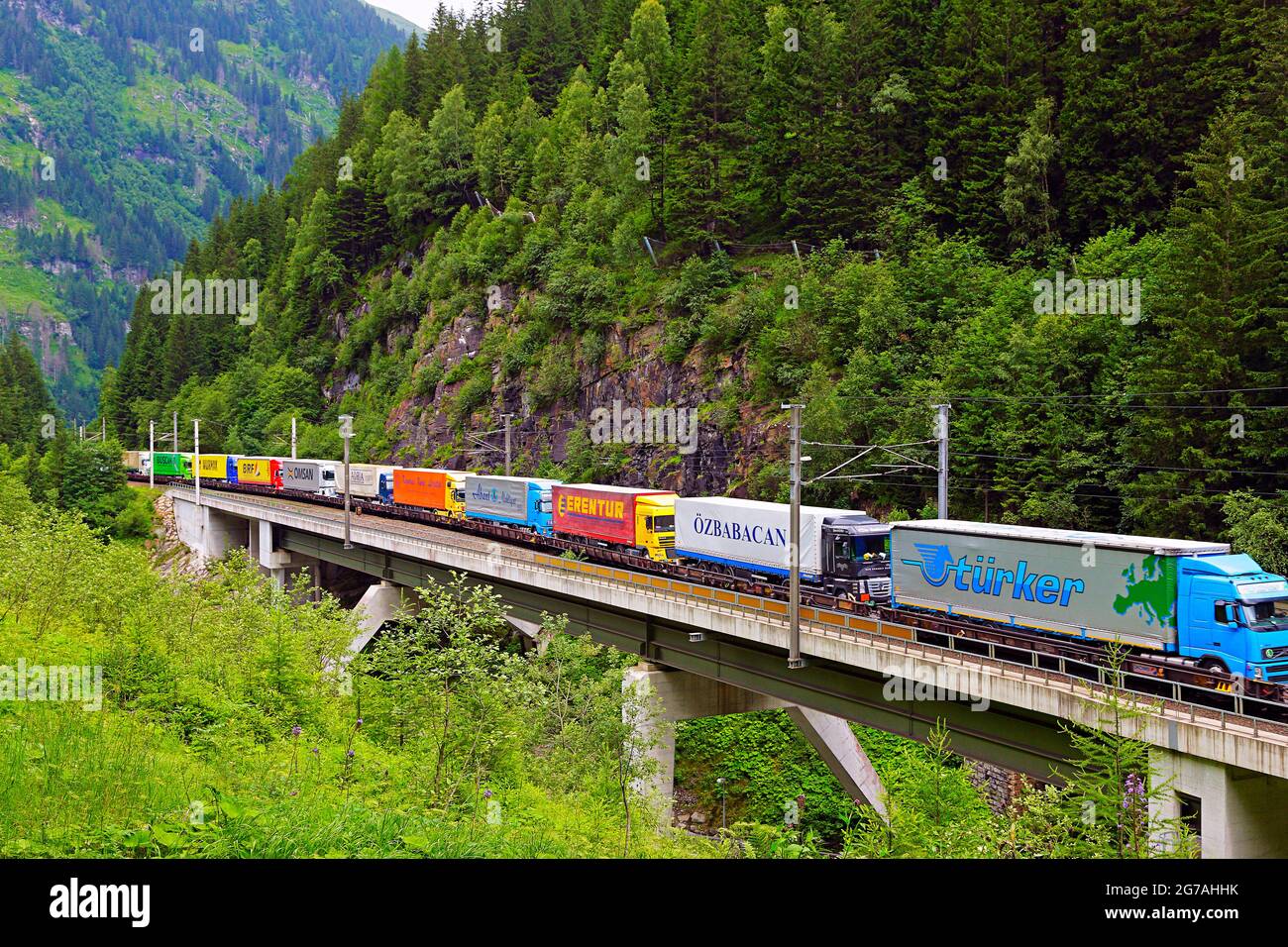 Lorries and articulated lorries on the rails of the Tauernbahn Nordrampe, State of Salzburg, Austria Stock Photo