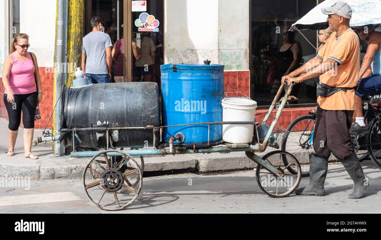 Cuban man working as water distributor in Holguin City, Cuba, 2016 ...