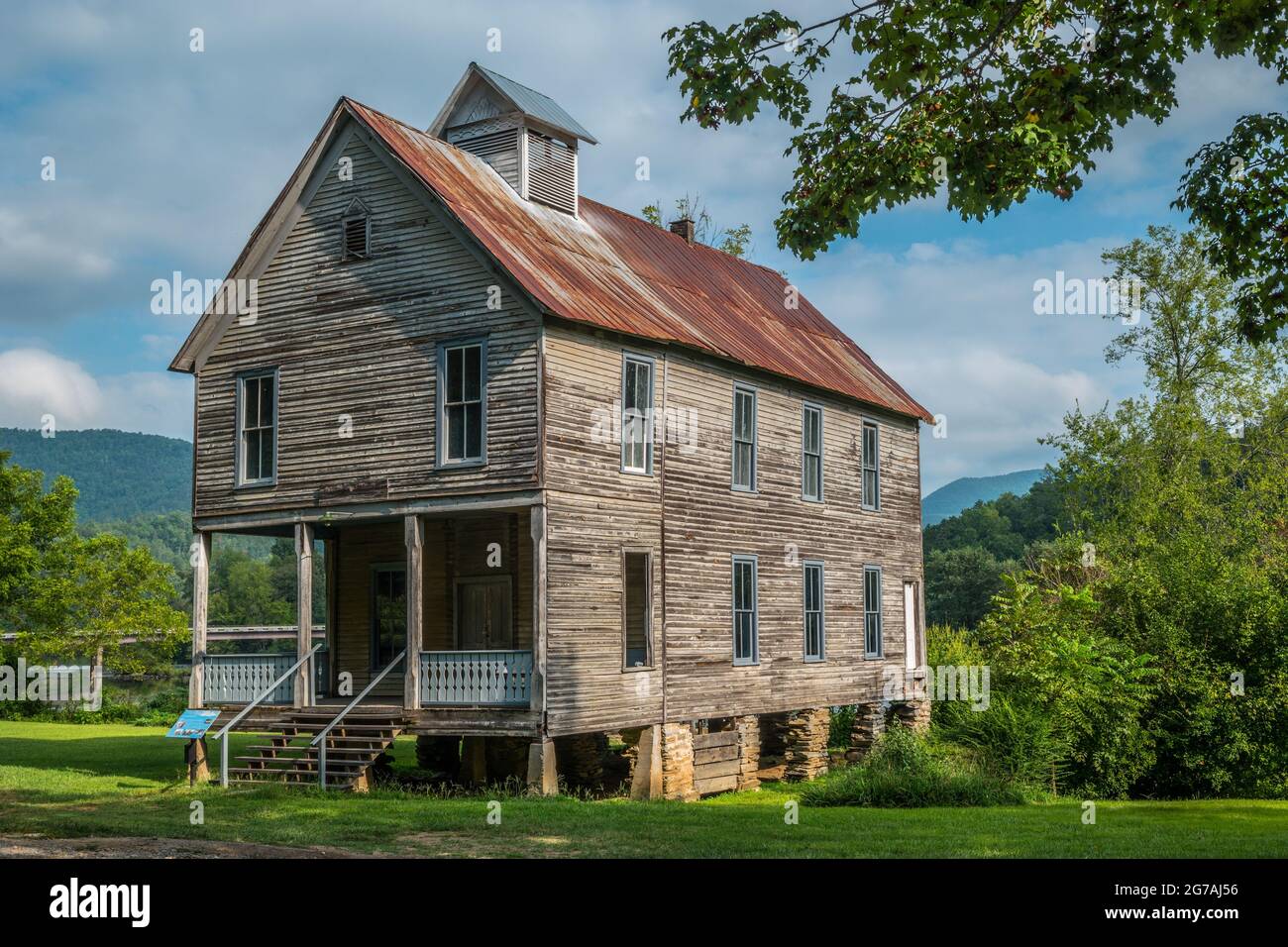 Old historic church also used as a school at one time still standing along the Hiawassee river in Reliance Tennessee on a bright sunny day in late sum Stock Photo