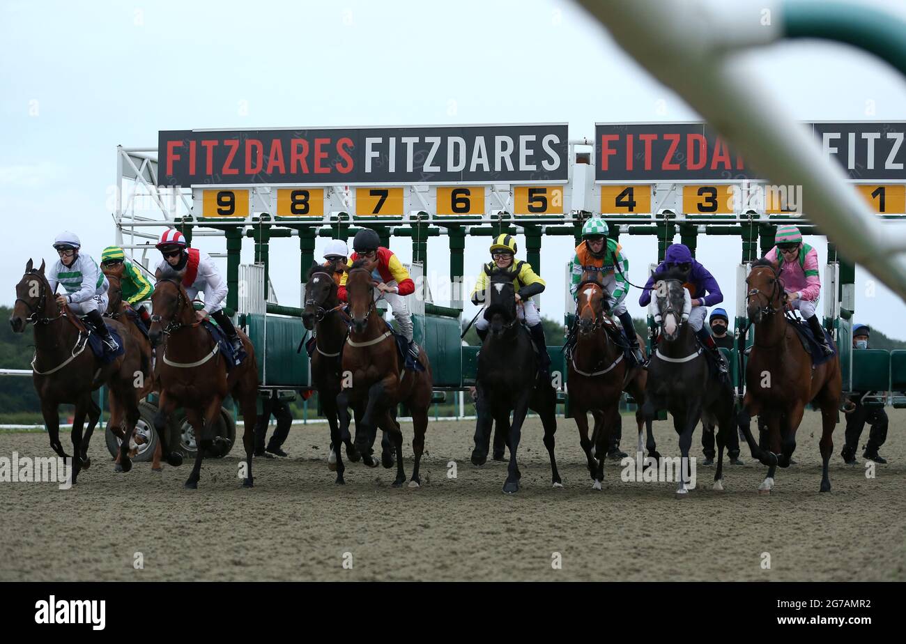 Runners And Riders Leave The Starting Gates In The Fitzdares Says Arise Sir Gareth Handicap At Lingfield Racecourse Picture Date Monday July 12 21 Stock Photo Alamy