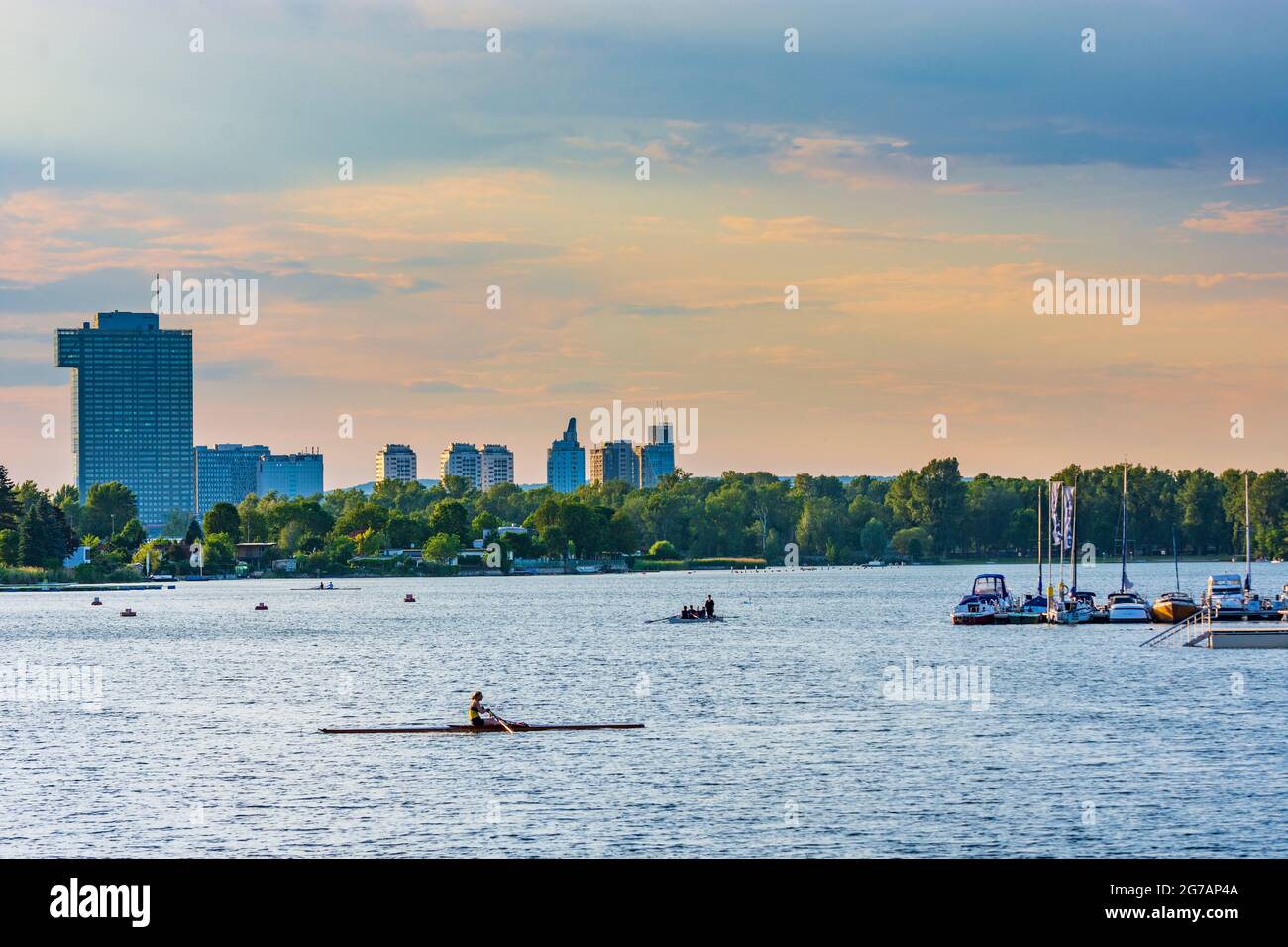 Vienna, oxbow lake Alte Donau (Old Danube), rower, rowing boat, IZD Tower in 22. Donaustadt, Wien / Vienna, Austria Stock Photo