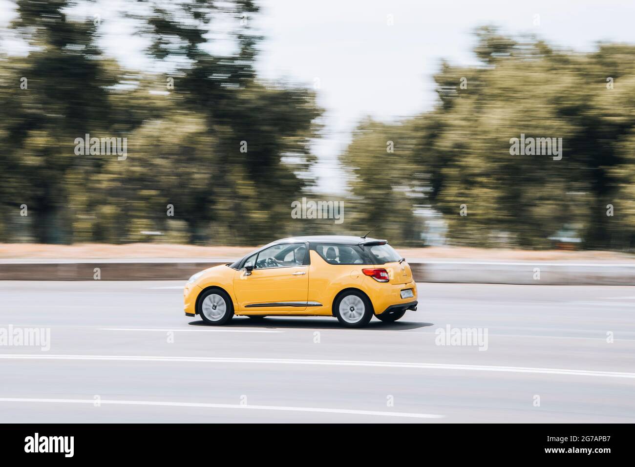 Ukraine, Kyiv - 27 June 2021: Yellow Citroen DS3 car moving on the street. Editorial Stock Photo