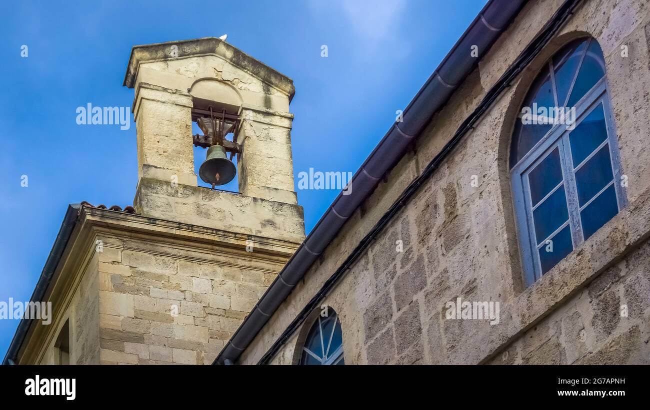 Bell tower of the Chapelle de la Miséricorde in Montpellier. Erected in the XIX century. A charitable pharmacy is attached to the chapel. Monument Historique. Stock Photo