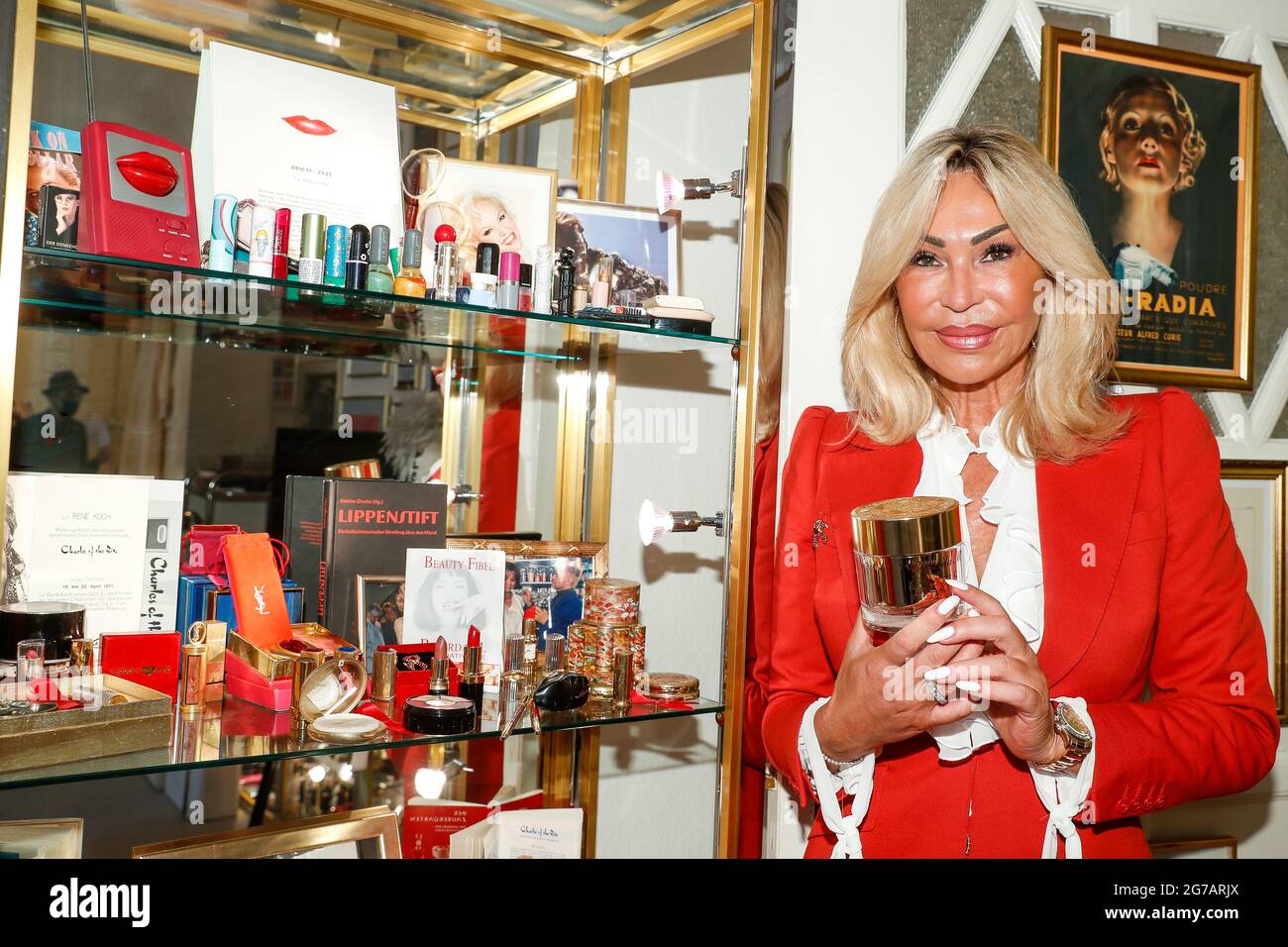 Berlin, Germany. 12th July, 2021. Ricarda M. stands next to her products at  the International Lipstick Day Celebration Lipstick and Cheque  Presentation. Designer Ricarda M. presents the first edition of her Magic