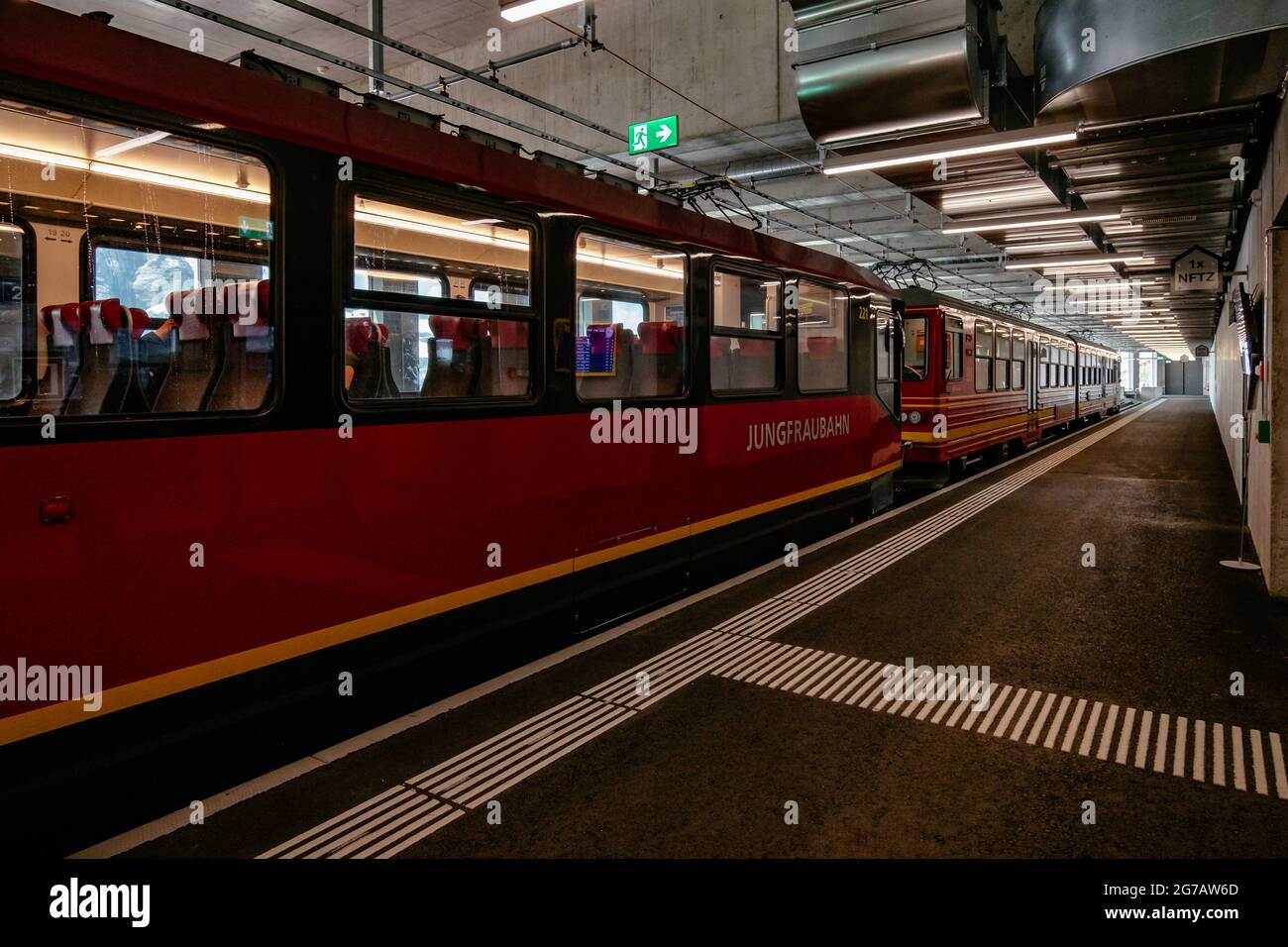 Red Iconic Train to Jungfraujoch - Jungfrau Region - Swiss Alps, Switzerland - Grindelwald, Interlaken, Lauterbrunnen Stock Photo