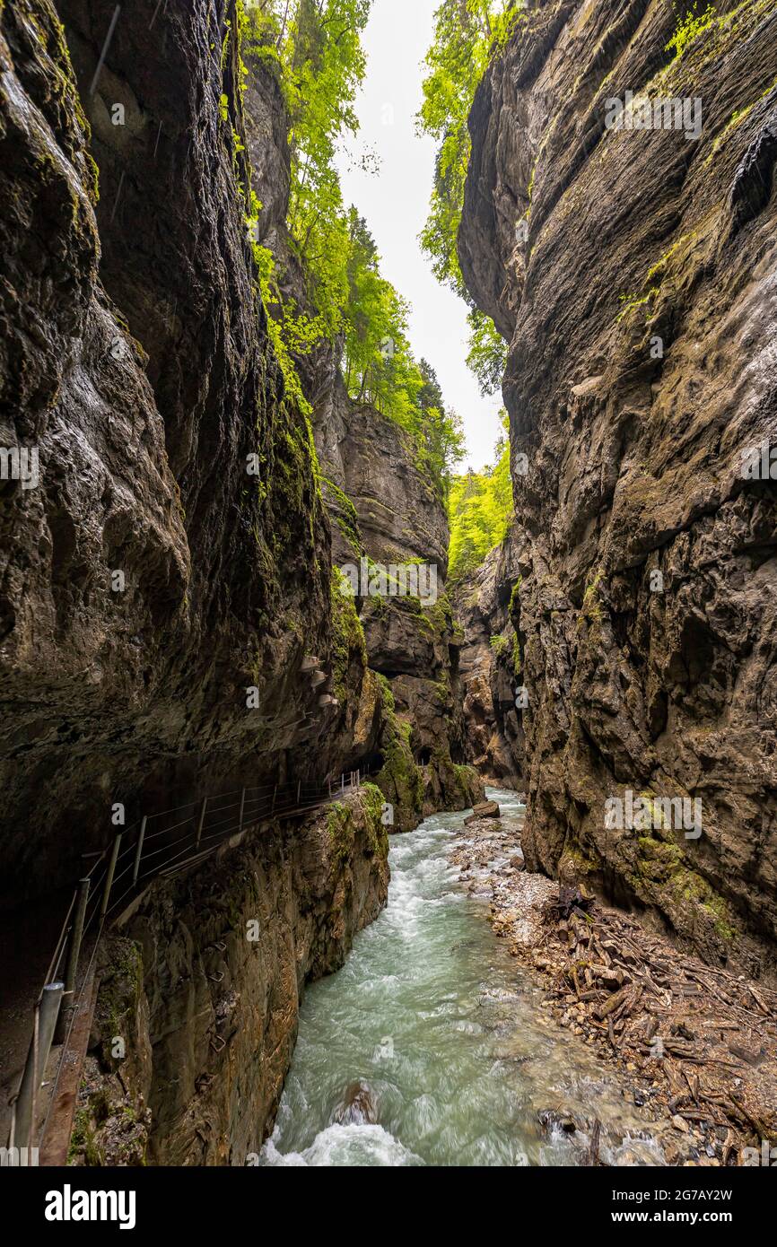 View through the rock walls and the river of the Partnachklamm, Garmisch-Partenkirchen, Upper Bavaria, Germany Stock Photo