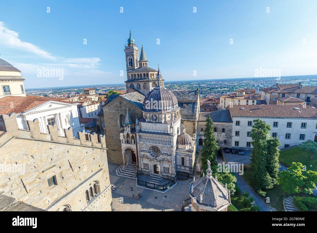 Bergamo, Italy - July 10, 2021: street view of Bergamo Alta citadel in full daylight, people are visible in the distance. Stock Photo