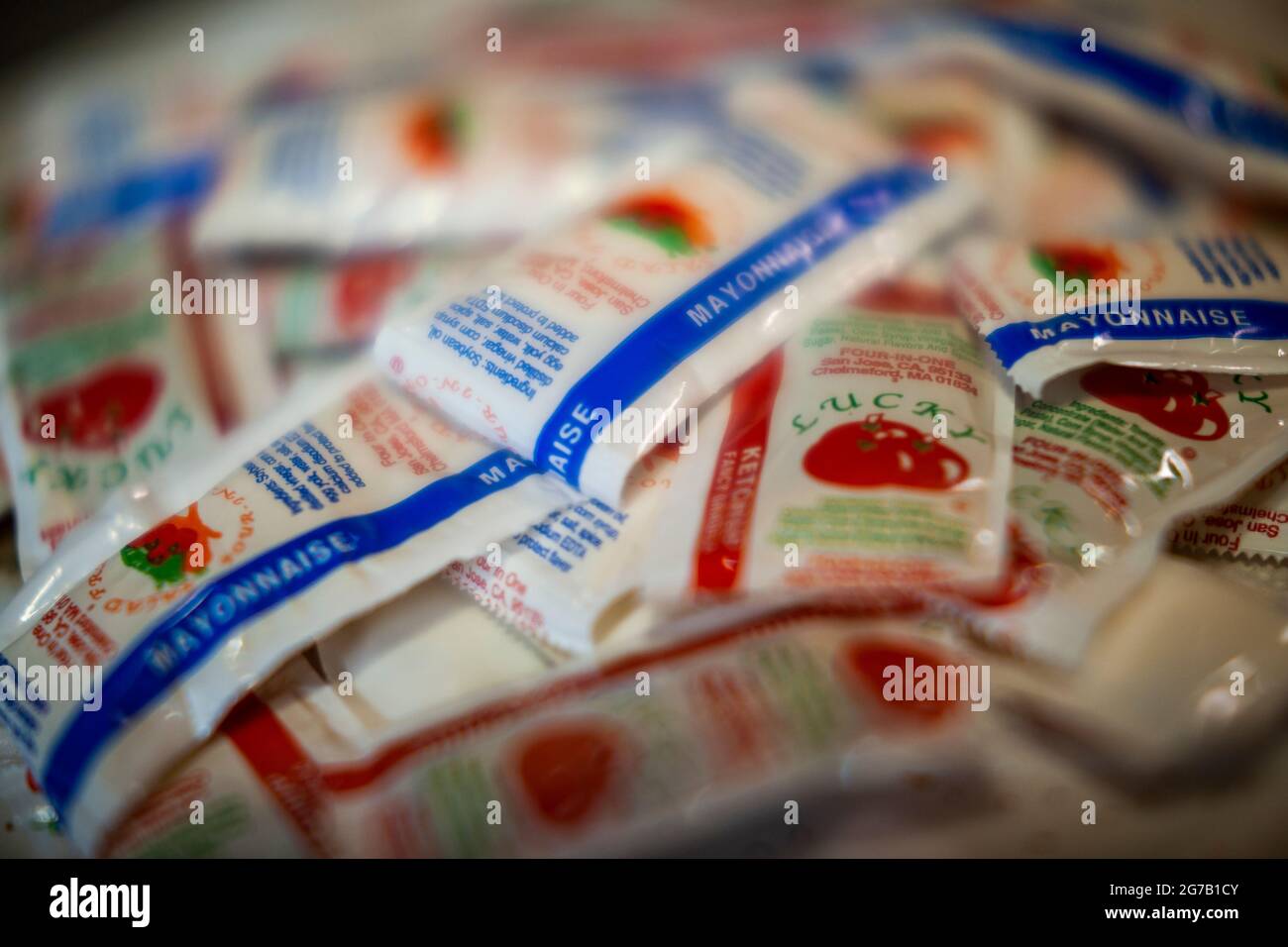 Individual packets of ketchup and mayonnaise in a store in New York on