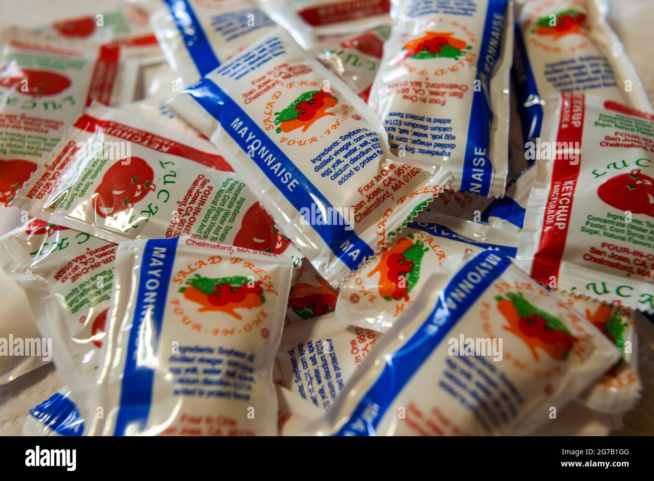 Individual packets of ketchup and mayonnaise in a store in New York on