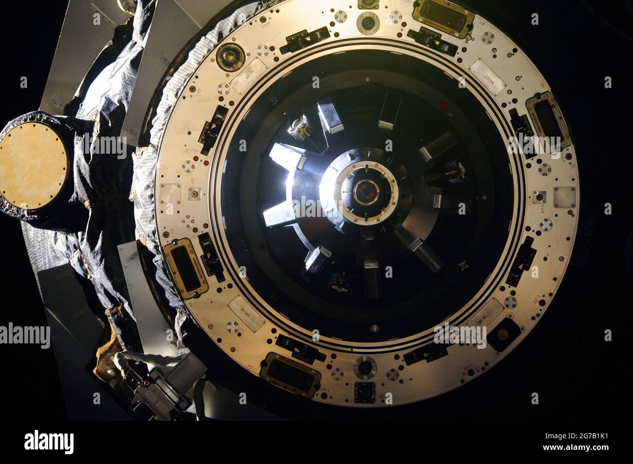 International Space Station (ISS.) This close-up view shows the docking mechanism of ISS Progress M-21M (53P) resupply craft as it undocks from the International Space Station's Zvezda Service Module aft port on 9 June 2014.  A unique optimised and enhanced version of an NASA image / credit: NASA Stock Photo