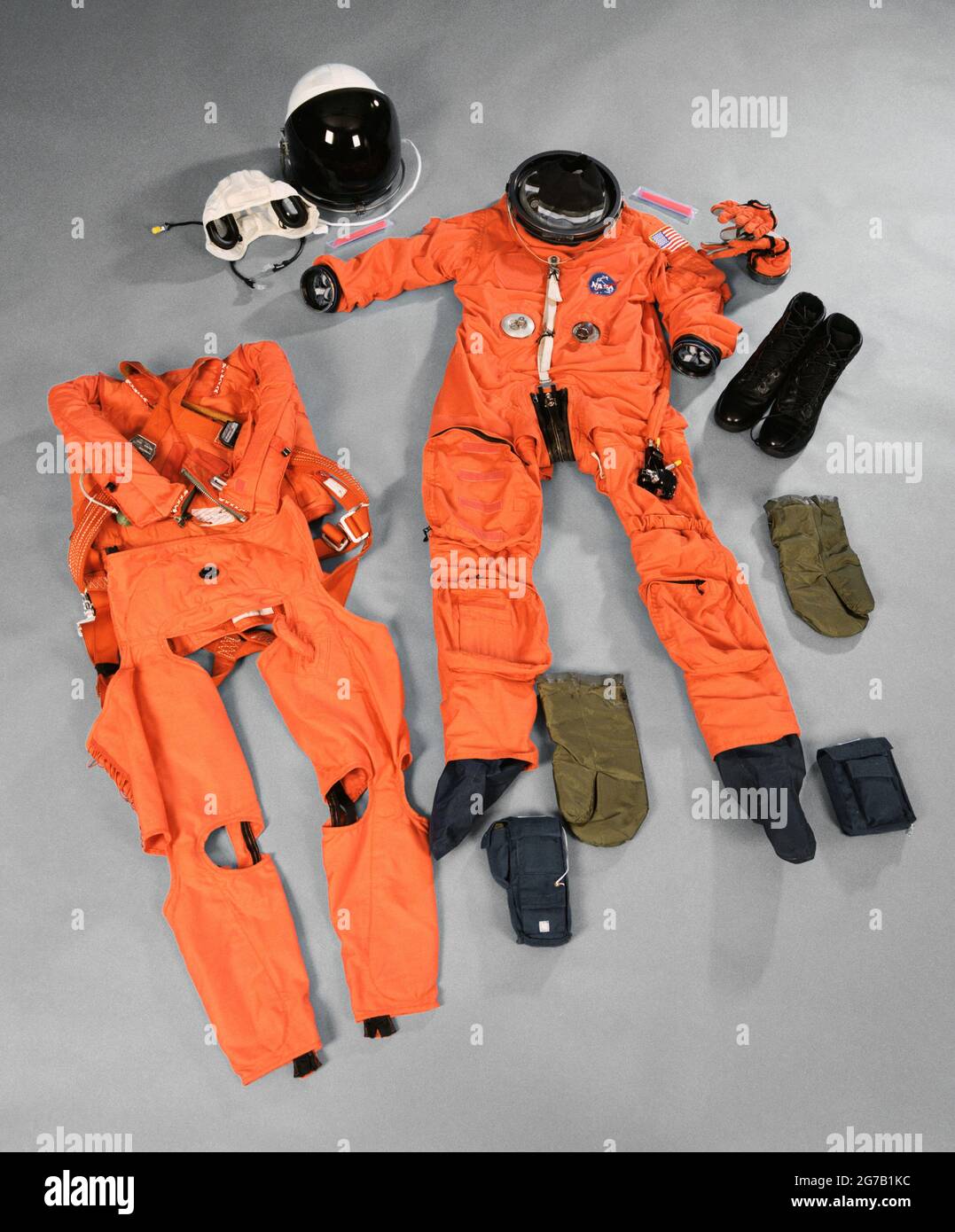 Tabletop documentation of Space Shuttle Crew Escape Equipment. Front views of the Advanced crew escape suit (ACES), helmet, communications carrier, adult pants, boots, gloves, survival mittens, survival packs, anti-g suit, harness assembly and light sticks. First used on STS-64, which landed on September 20, 1994. Ê An optimised and enhanced version of an NASA image / credit NASA. Editorial use only. Stock Photo