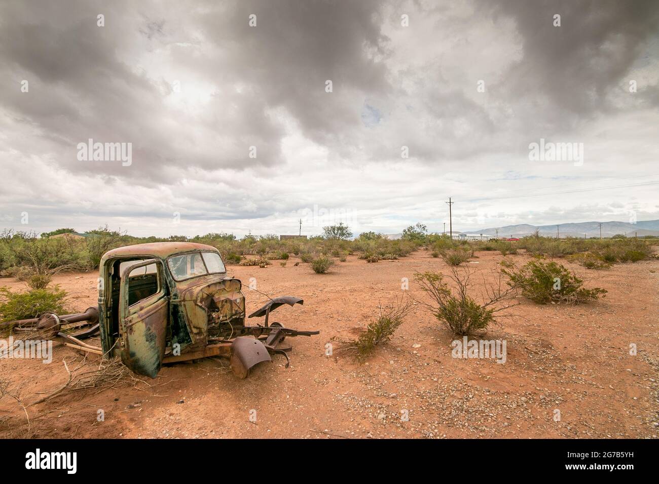 old rusty American car at Salvage yard in the desert Alamogordo, New