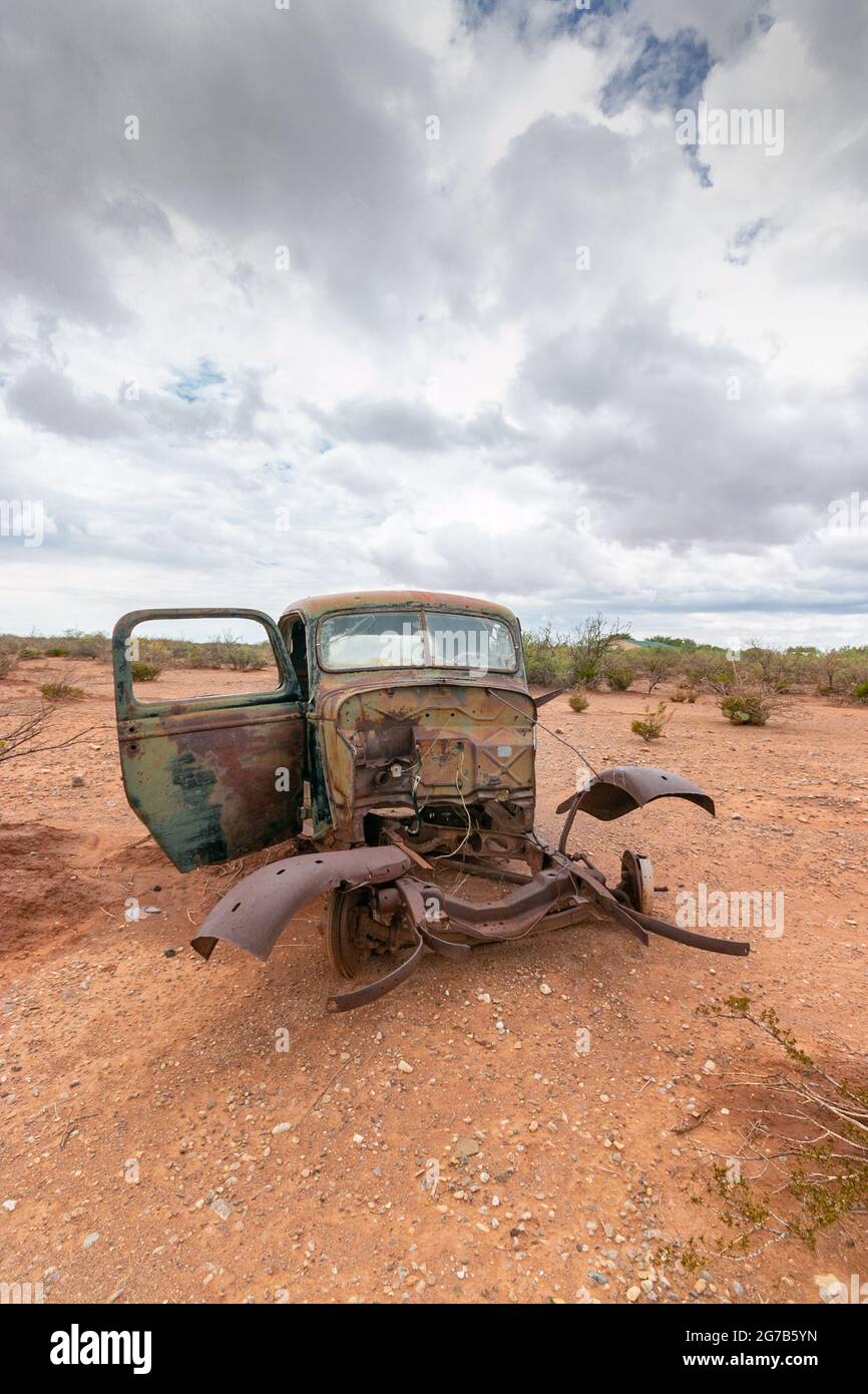 old rusty American car at Salvage yard in the desert Alamogordo, New