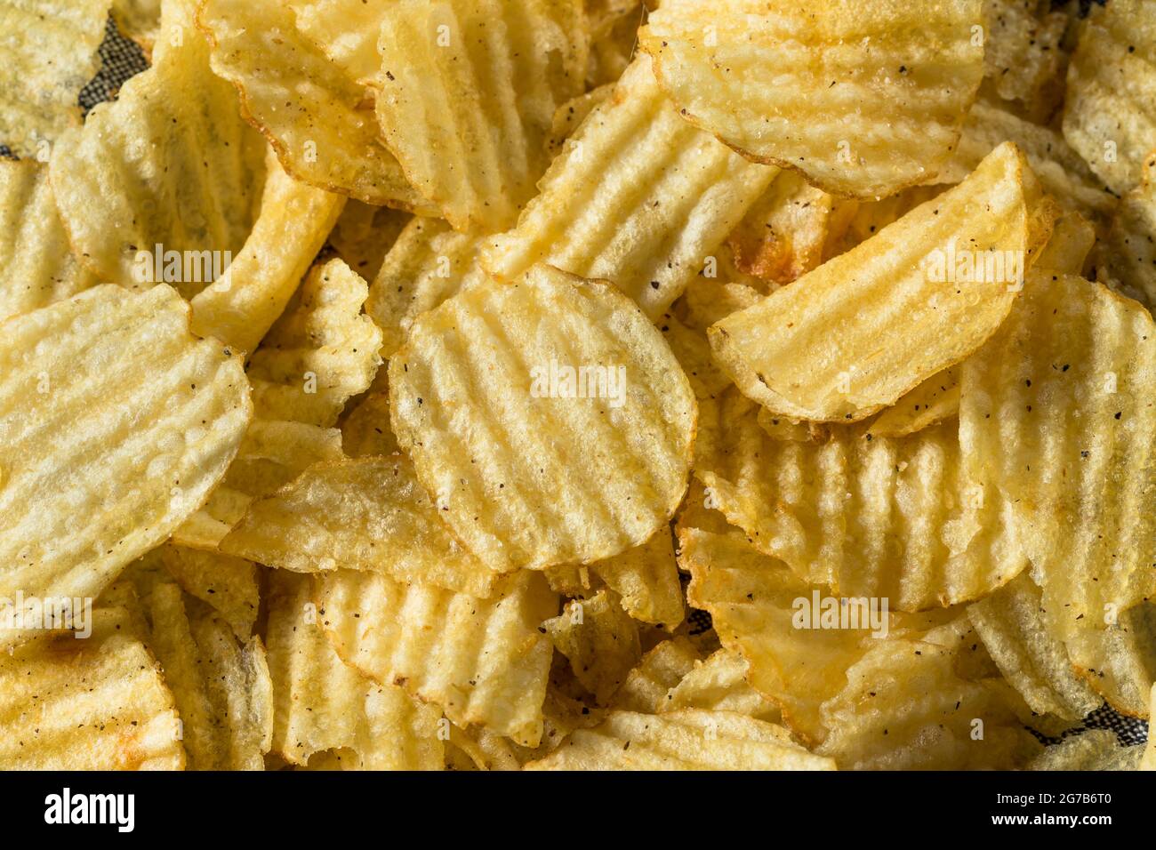Fatty Ruffled Potato Chips Ready to Eat Stock Photo