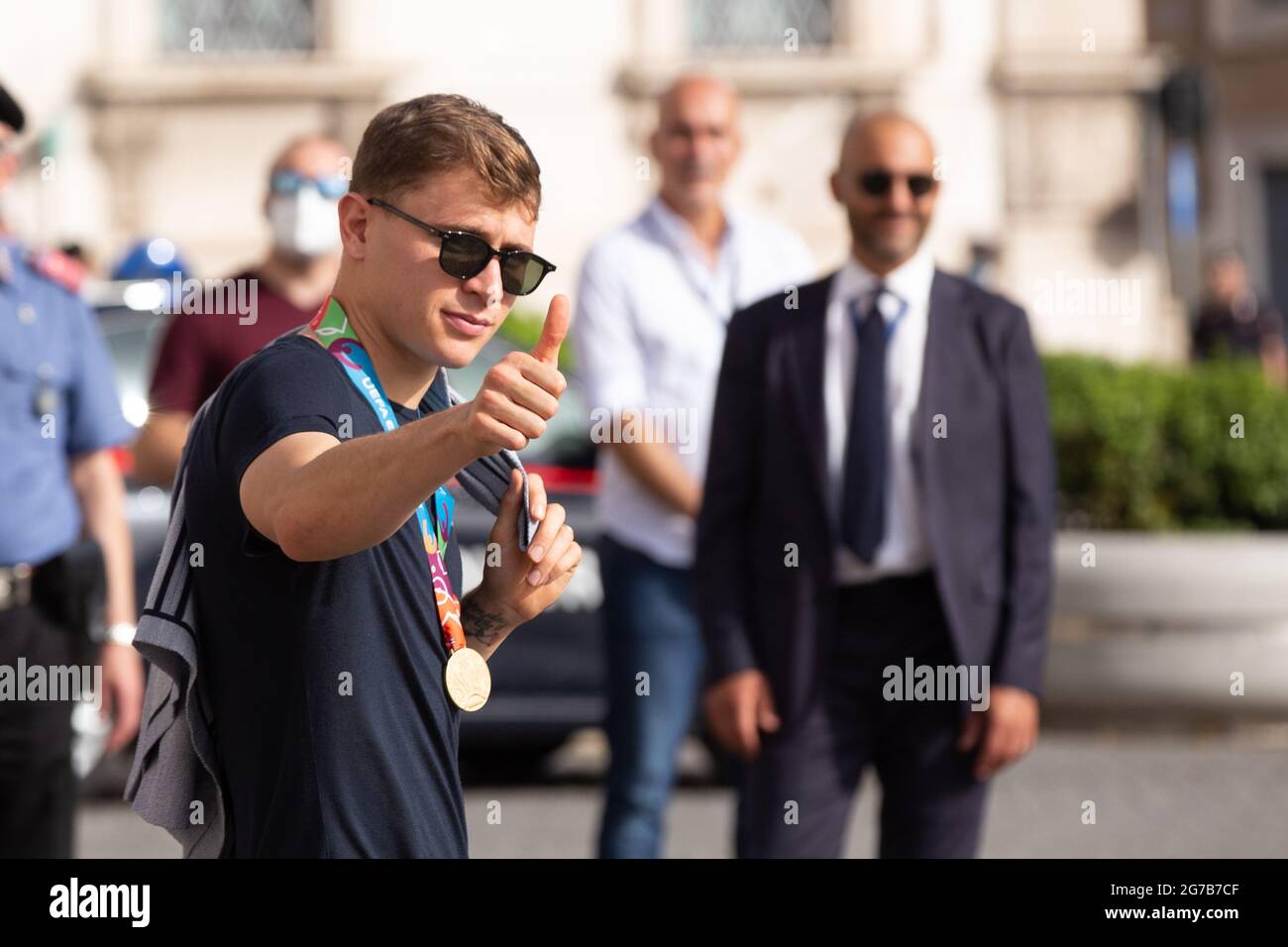Rome, Italy. 12th July, 2021. Niccolò Barellathe player of the Italian National Football Team enter the Quirinal Palace in Rome to visit the President of the Republic Sergio Mattarella after the victory of the European Football Championships, raising the cup won to the sky. The Italian tennis player Matteo Berrettini, finalist at the Wimbledon tournament, also attended the ceremony (Photo by Matteo Nardone/Pacific Press/Sipa USA) Credit: Sipa USA/Alamy Live News Stock Photo