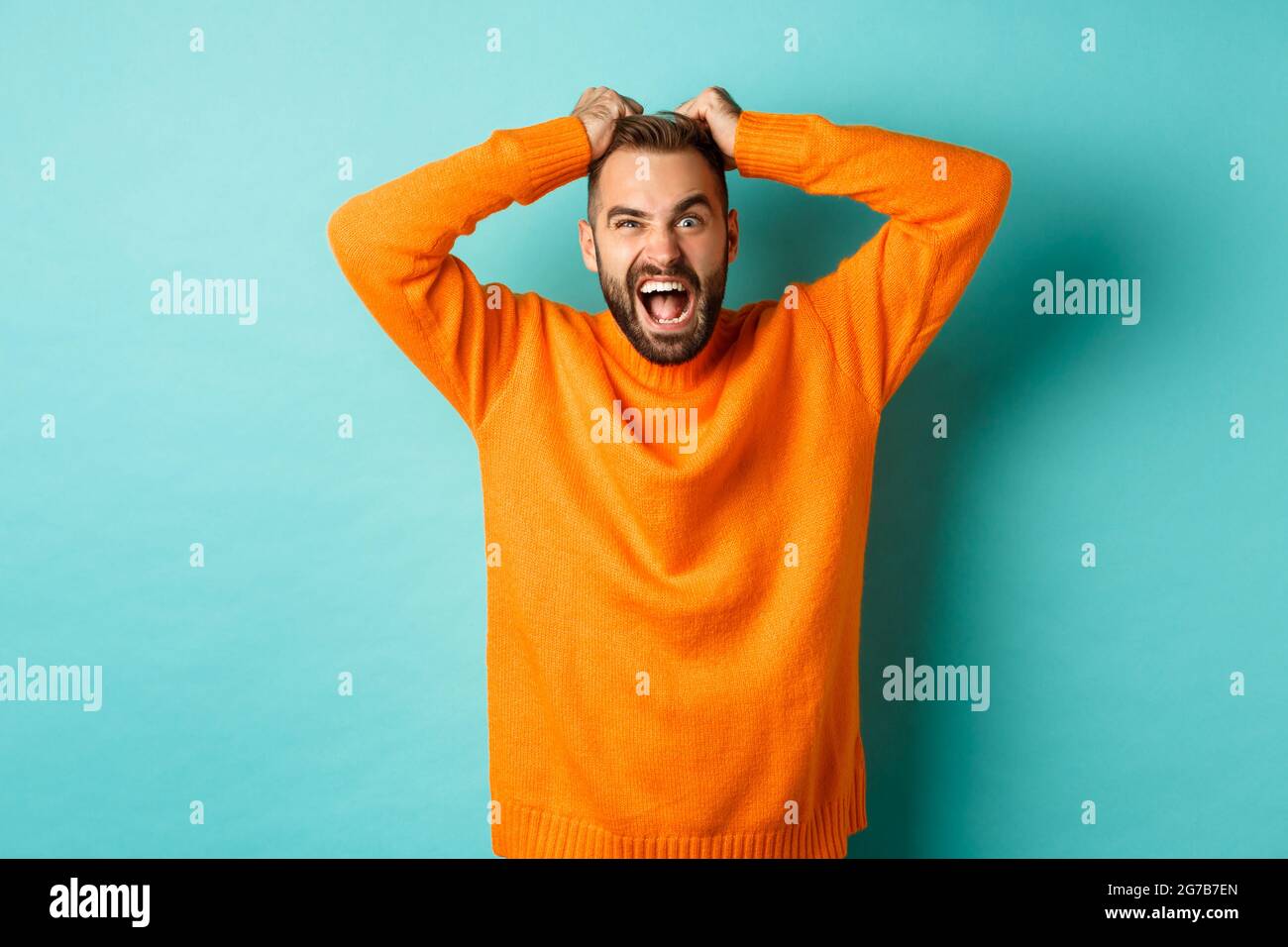 Frustrated Man Shouting Pulling Out Hair And Screaming Angry Losing Temper And Looking Mad