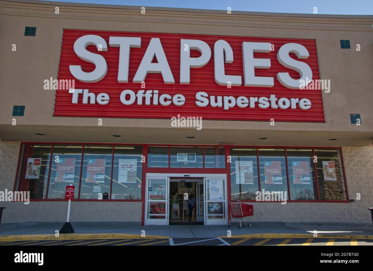 Augusta, Ga USA - 03 04 21: Staples retail store entrance and windows signs people inside - Robert C Daniel Parkway Stock Photo