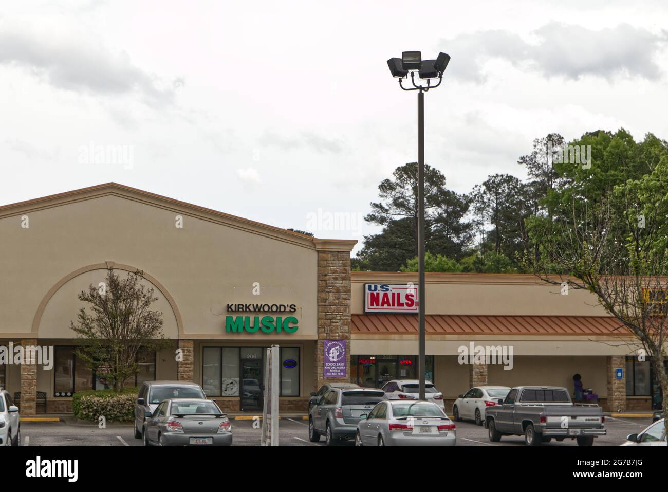 Columbia County, Ga USA 04 10 21 An urban stucco strip mall retail outlet Nail salon and