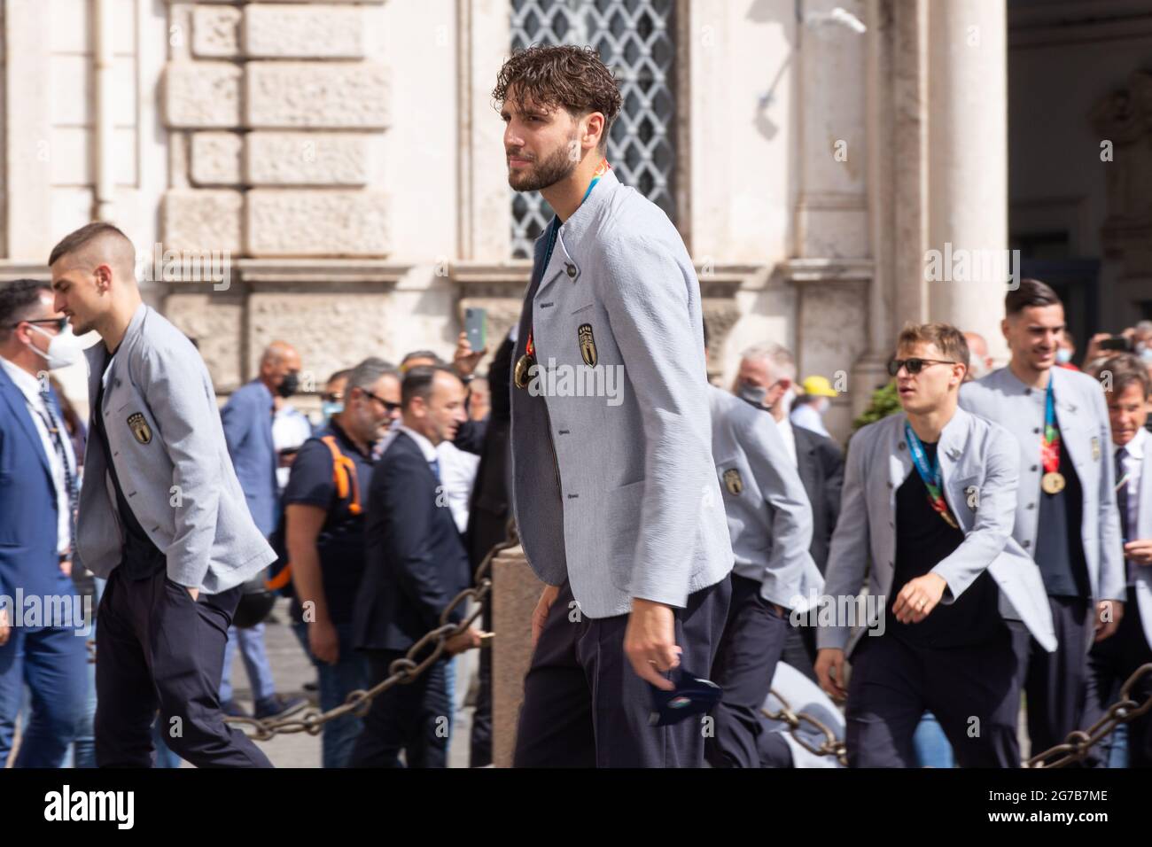 Rome, Italy. 12th July, 2021. Manuel Locatellithe player of the Italian National Football Team enter the Quirinal Palace in Rome to visit the President of the Republic Sergio Mattarella after the victory of the European Football Championships, raising the cup won to the sky. The Italian tennis player Matteo Berrettini, finalist at the Wimbledon tournament, also attended the ceremony (Photo by Matteo Nardone/Pacific Press/Sipa USA) Credit: Sipa USA/Alamy Live News Stock Photo