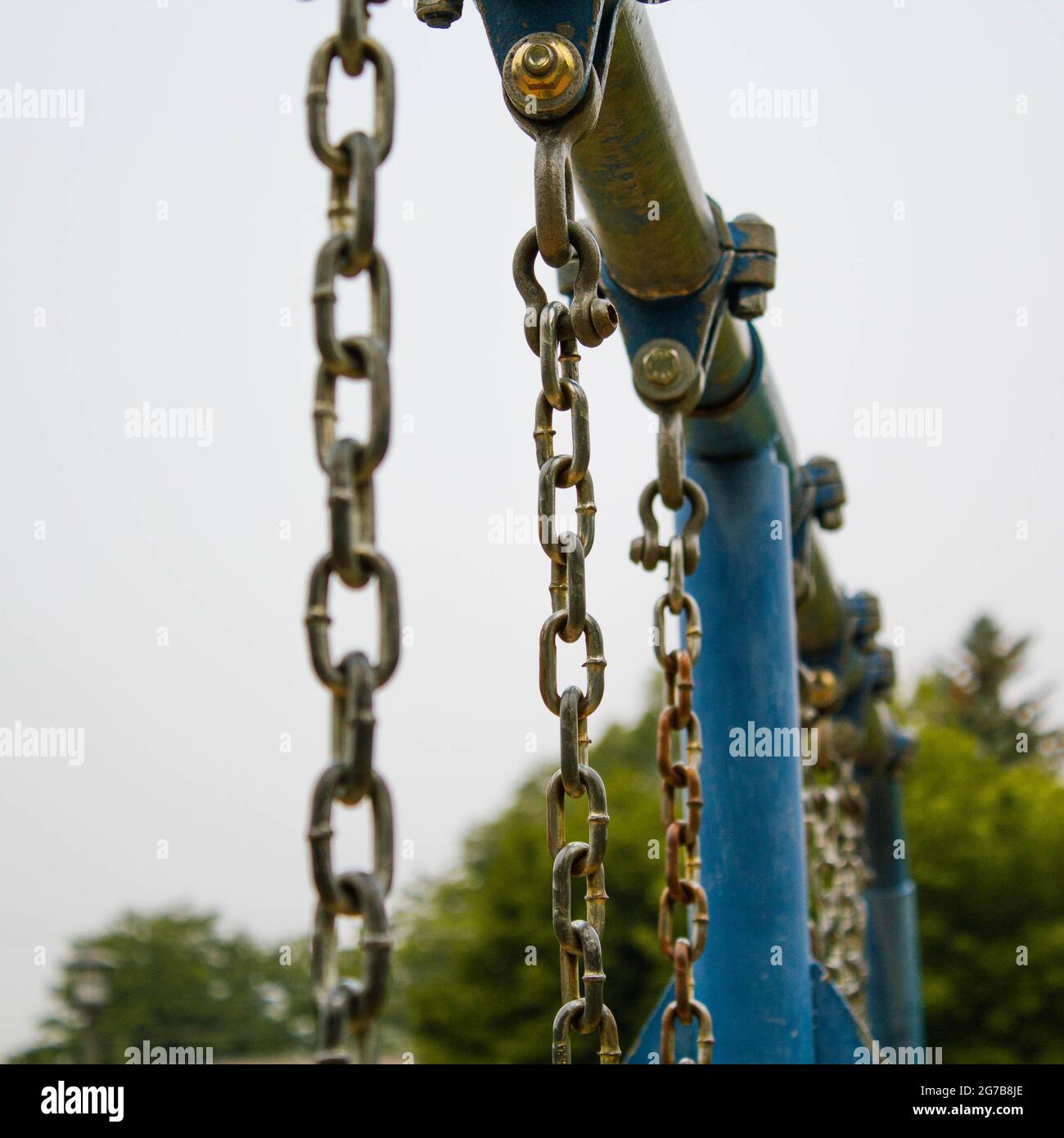 Chains from a swing Stock Photo Alamy