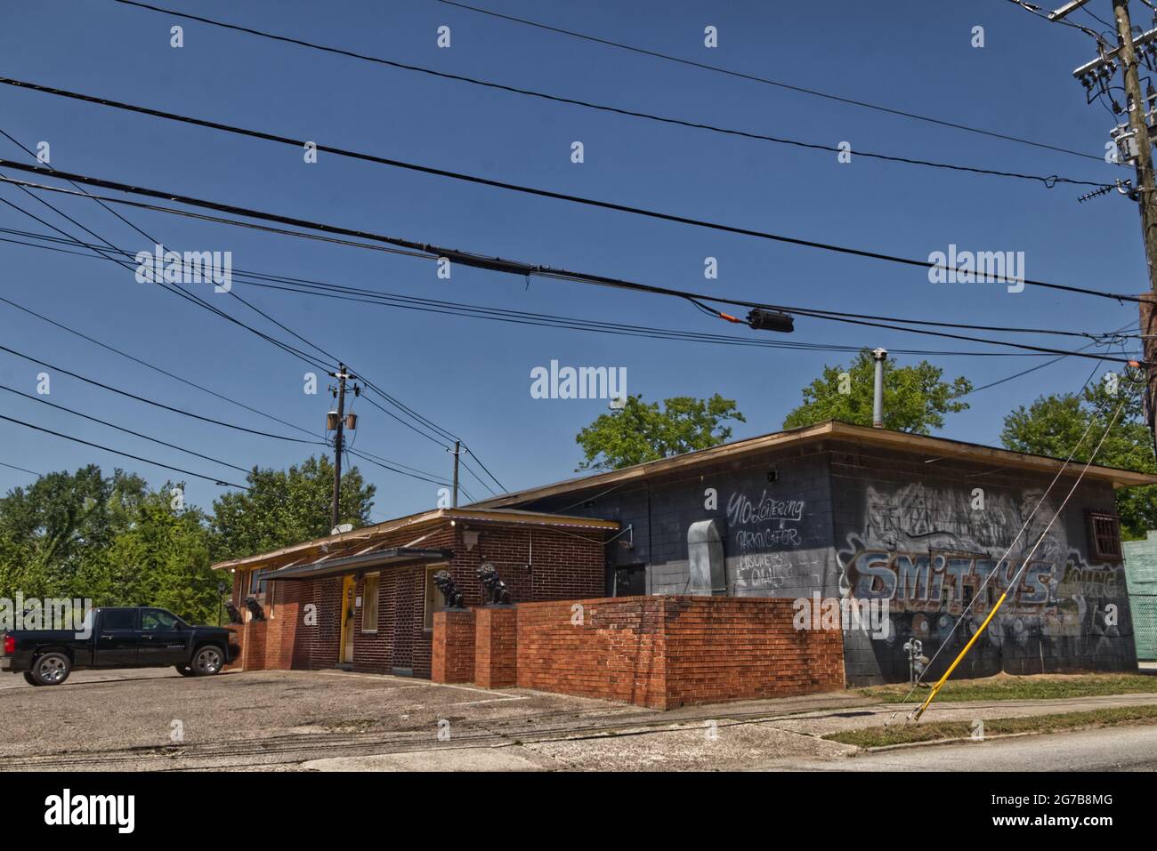 Augusta, Ga USA - 04 22 21: Vintage brick building with black painted ...