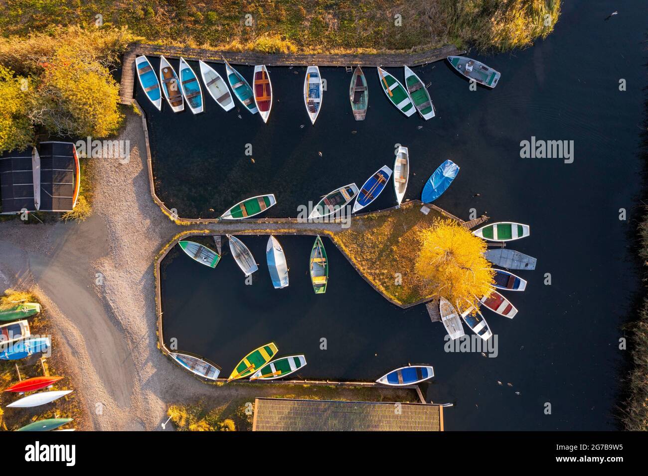 Rowing boats in the harbour from above, Seehausen am Staffelsee, morning light in autumn, drone shot, alpine foreland, Upper Bavaria, Bavaria, Germany Stock Photo