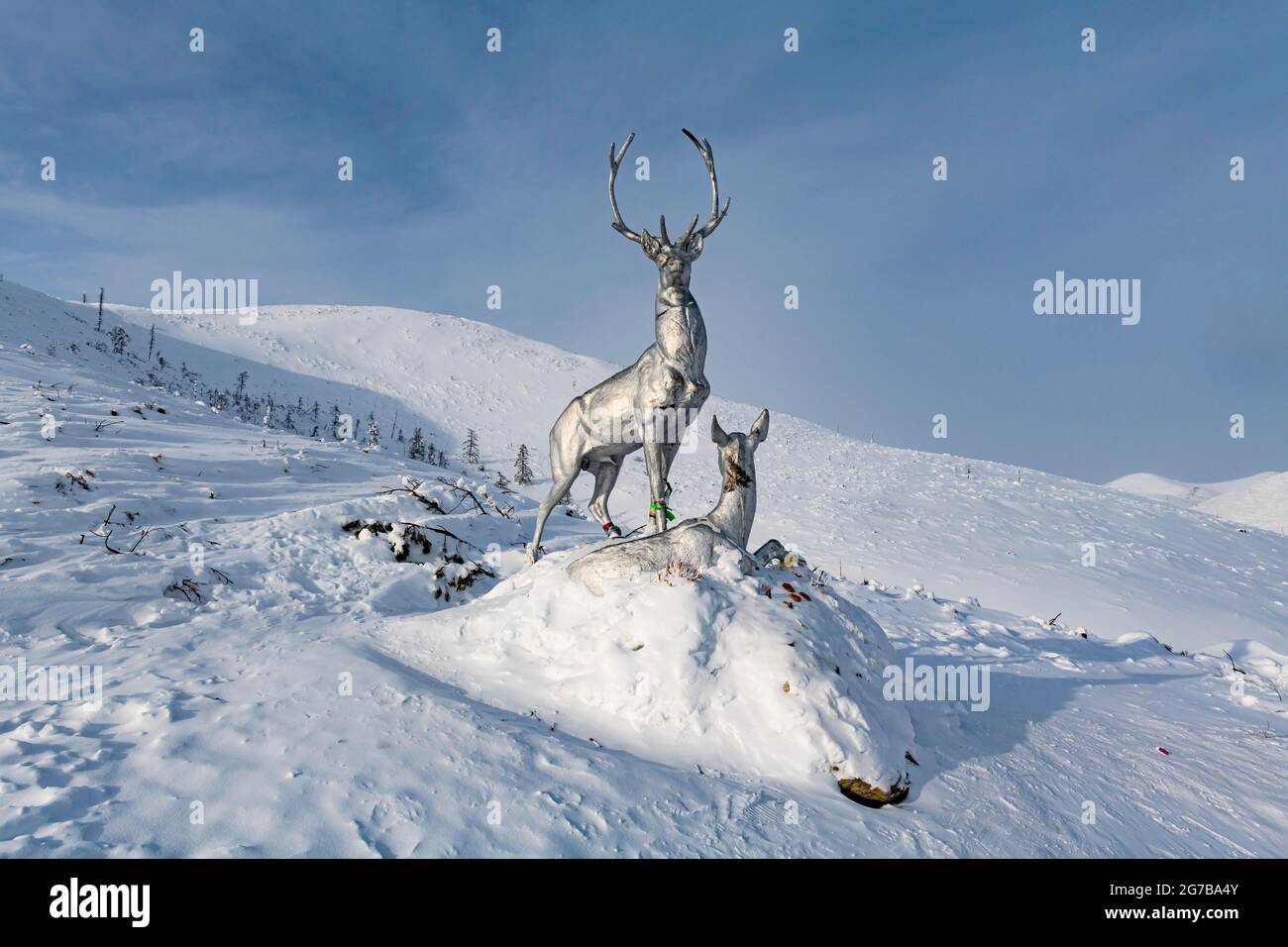 Deer monument on a snow covered mountain pass, Suntar-Khayata mountain Range, Road of Bones, Sakha Republic, Yakutia, Russia Stock Photo