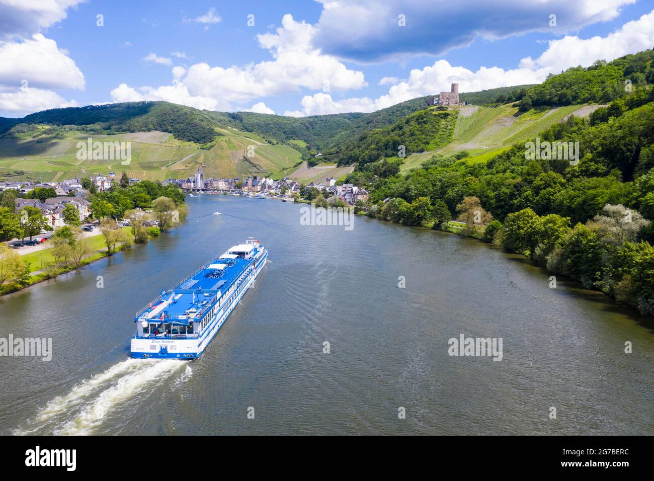River cruise shipapporaching Bernkastel Kues, Moselle valley, Germany Stock Photo