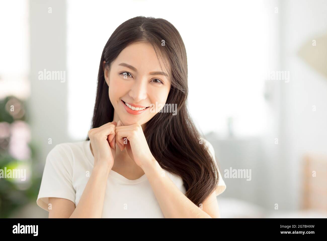 closeup smiling  young  woman face with clean  healthy skin Stock Photo