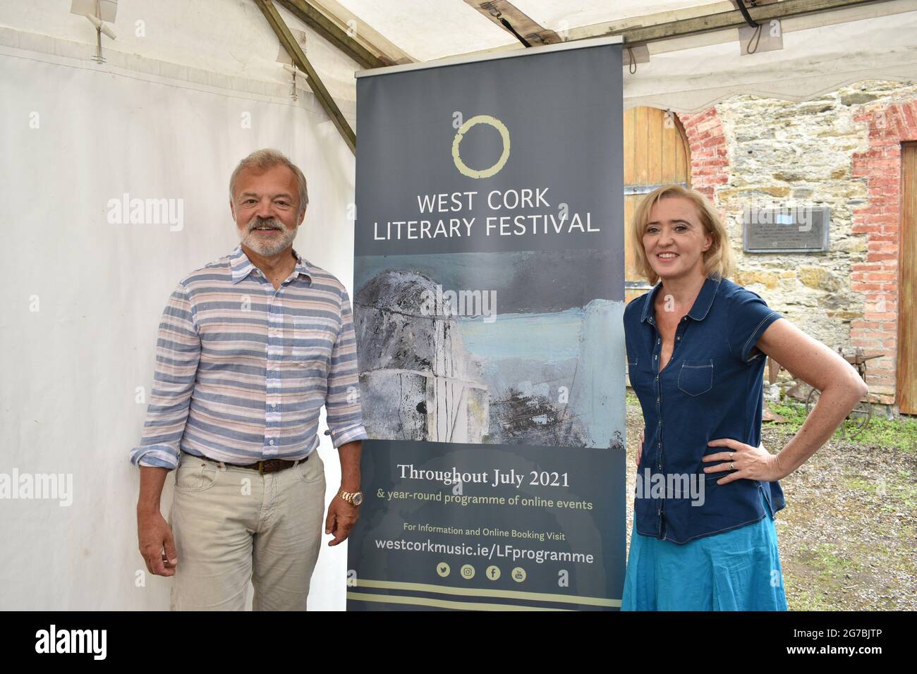 Bantry, West Cork, Ireland. 12th July 2021. West Cork Literary Festival last day of live outdoor events featuring numerous writers. Pictured below book writer and presenter Graham Norton who was interviewed by Liz Nugent (on the right) . Credit: Karlis Dzjamko/Alamy Live News Stock Photo
