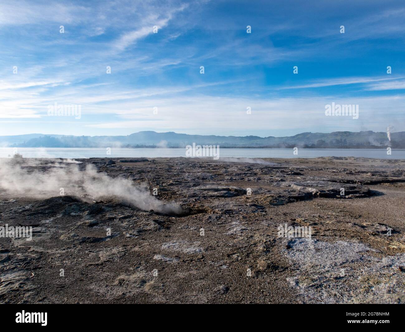 Sulphur Point is a strange and unique tourist attraction on the coastline in Rotorua, that looks like a desolate wasteland, with geothermal activity Stock Photo