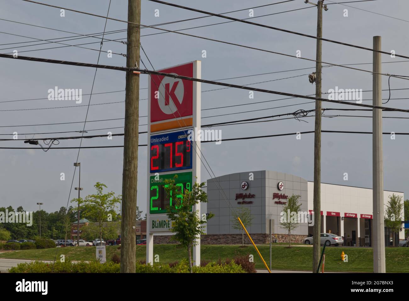Augusta, Ga USA - 04 29 21: Gas price digital sign Circle K gas station  Jiffy Lube in the background - Tobacco Road Stock Photo
