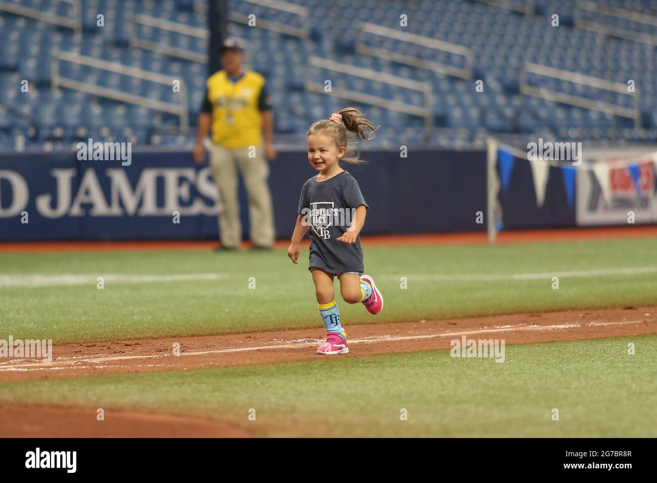 St. Petersburg, FL. USA;  Fans young and old were invited to run the bases after the game for the first time since the 2019 season after a major leagu Stock Photo